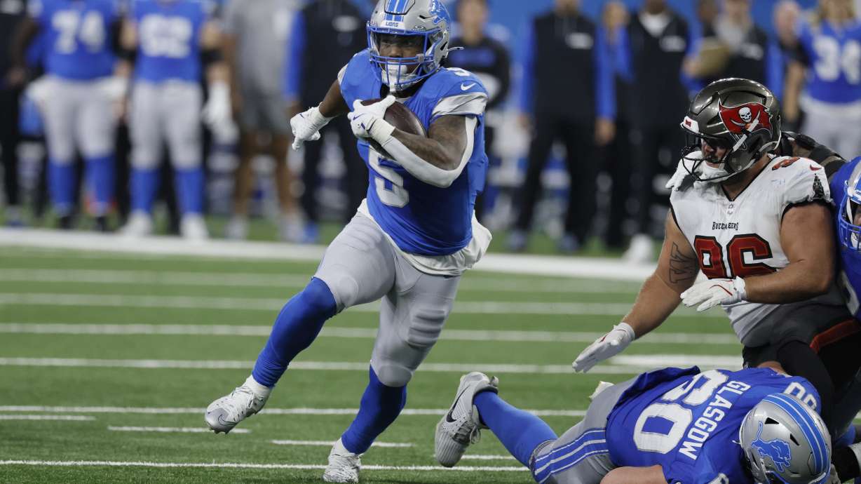 Detroit Lions running back David Montgomery (5) rushes during the second half of an NFL football game against the Tampa Bay Buccaneers, Sunday, Sept. 15, 2024, in Detroit.