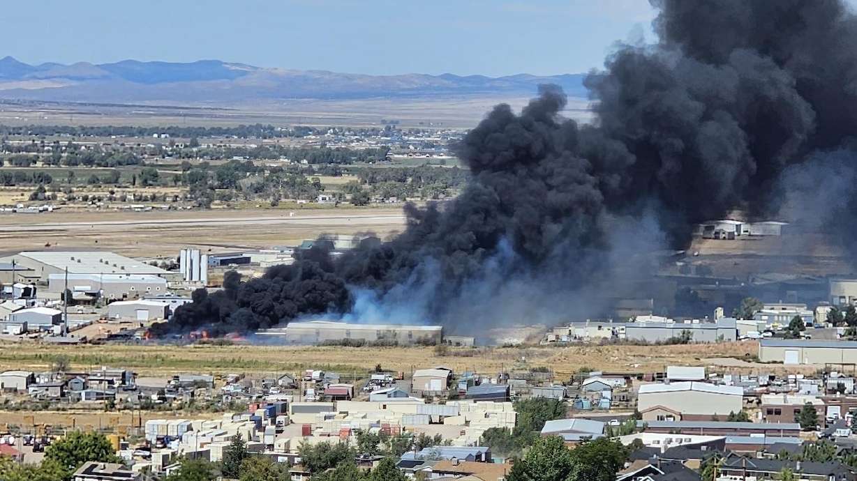 Smoke billows from a fire burning west of Airport Road on 850 North in Cedar City on Thursday afternoon.