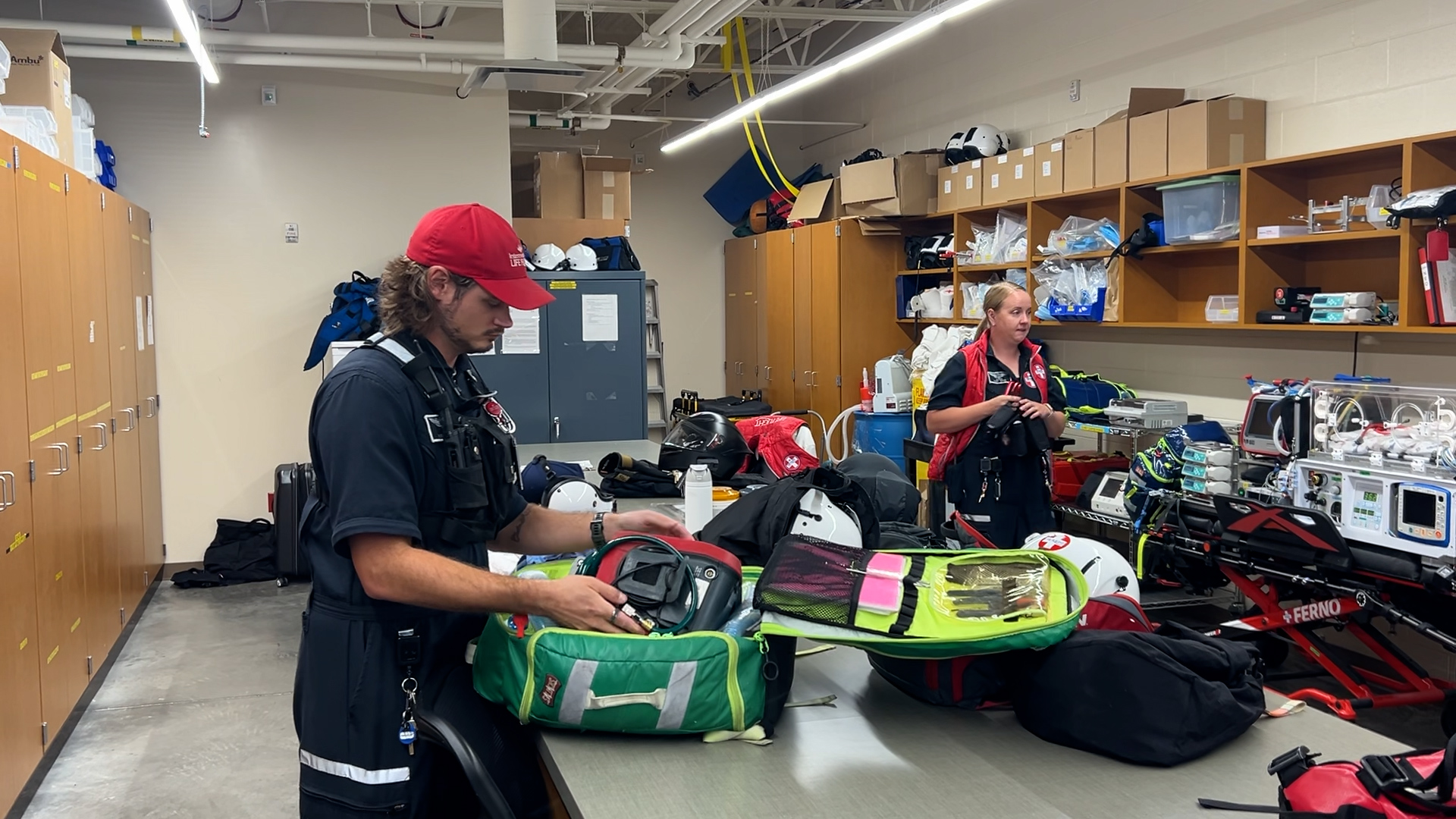 The Life Flight crews pack up their equipment before heading to the chopper this week.