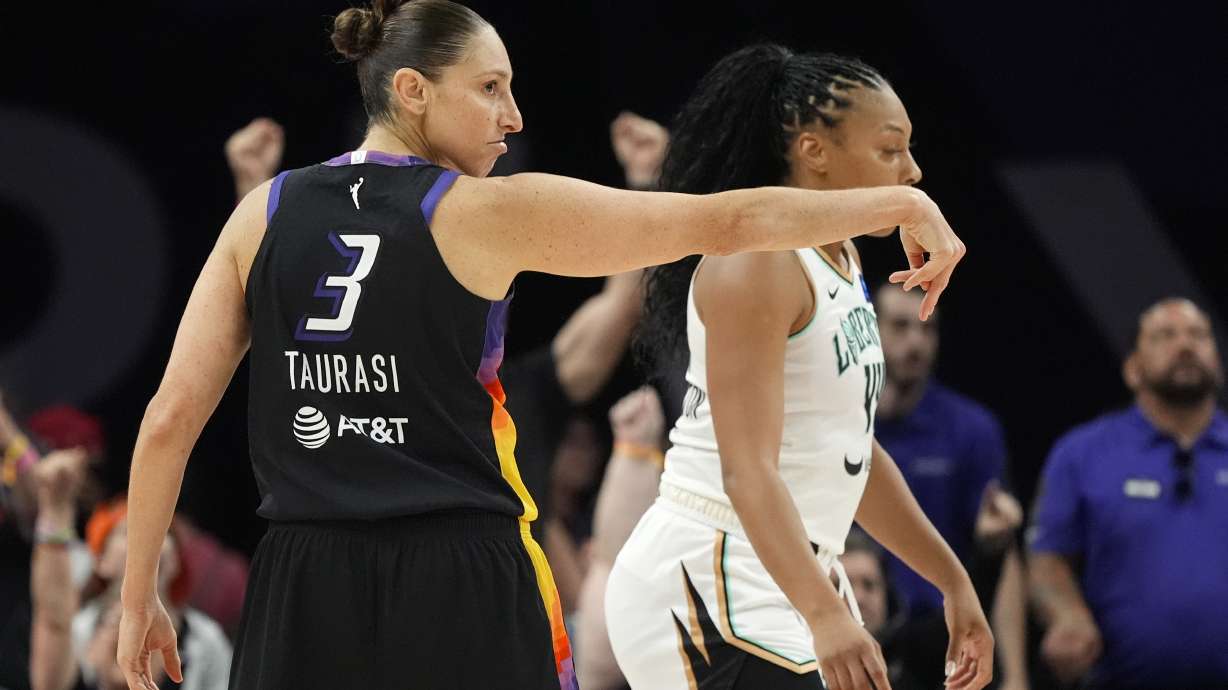 Phoenix Mercury guard Diana Taurasi (3) celebrates after her 3-point basket against the New York Liberty during the first half of a WNBA basketball game Monday, Aug. 26, 2024, in Phoenix.