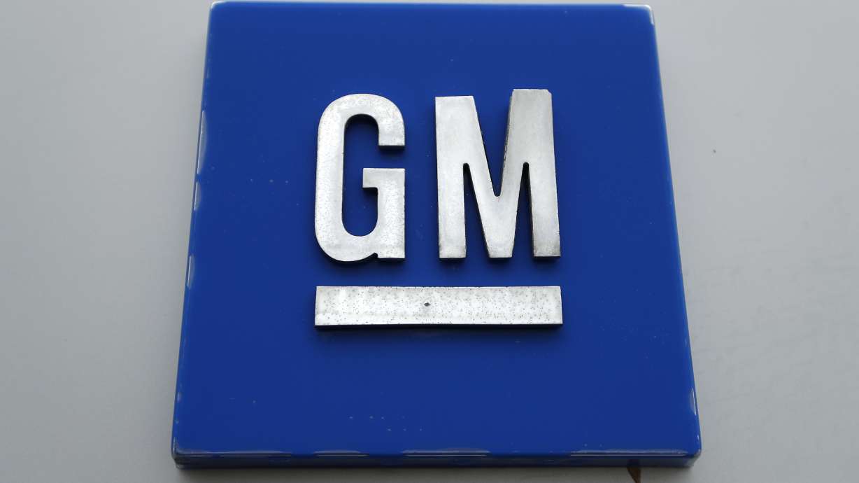 General Motors is recalling more than 449,000 of its SUVs and pickup trucks because the electronic brake control module software may fail to display a warning light.