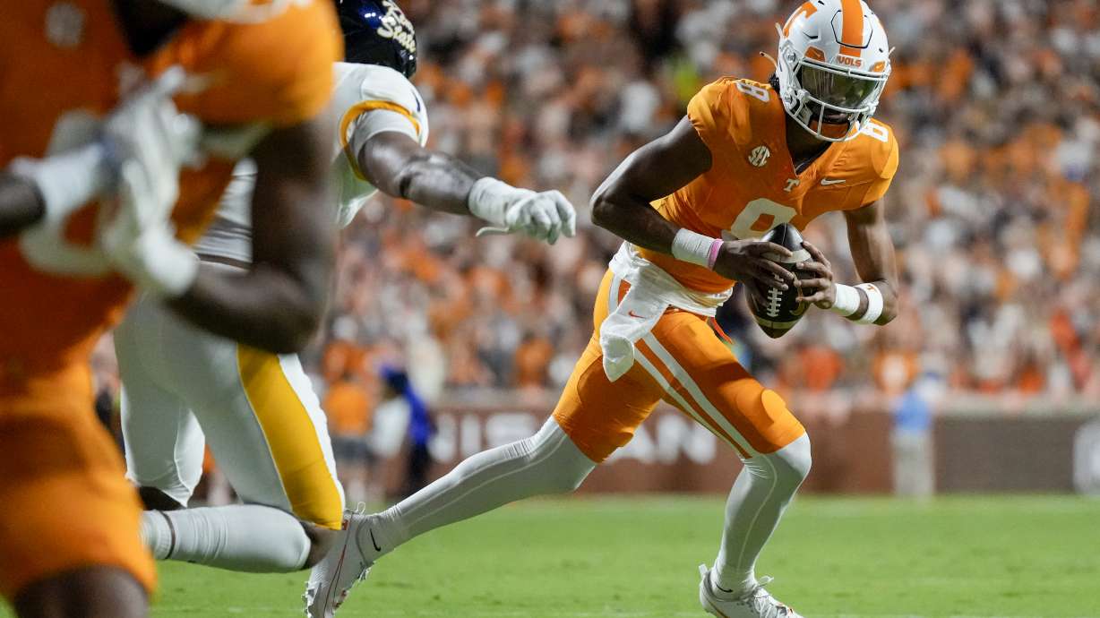 Tennessee quarterback Nico Iamaleava (8) runs the ball against Kent State during the first half of an NCAA college football game Saturday, Sept. 14, 2024, in Knoxville, Tenn.
