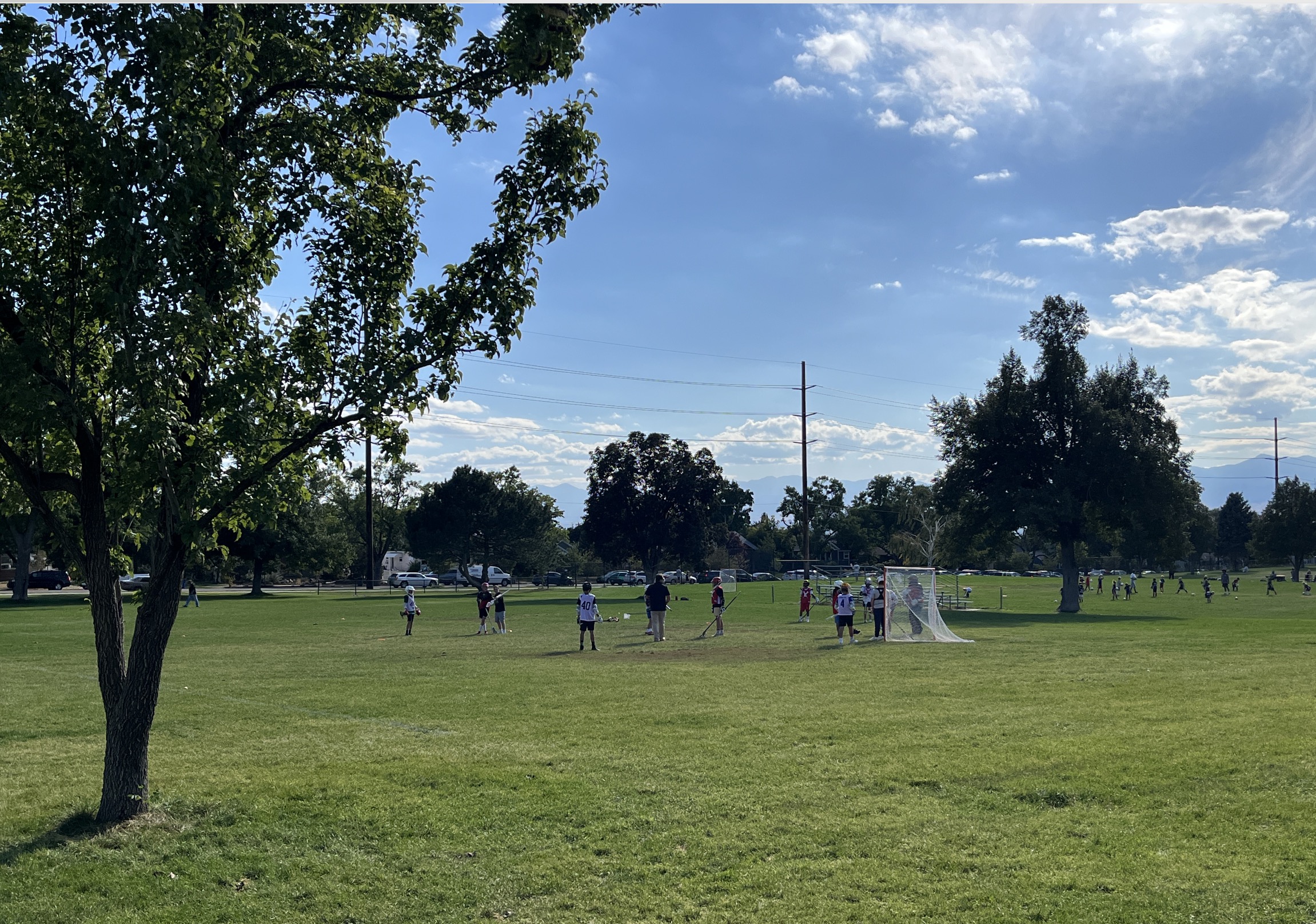 A youth lacrosse team practices at Sunnyside Park in Salt Lake City on Wednesday.