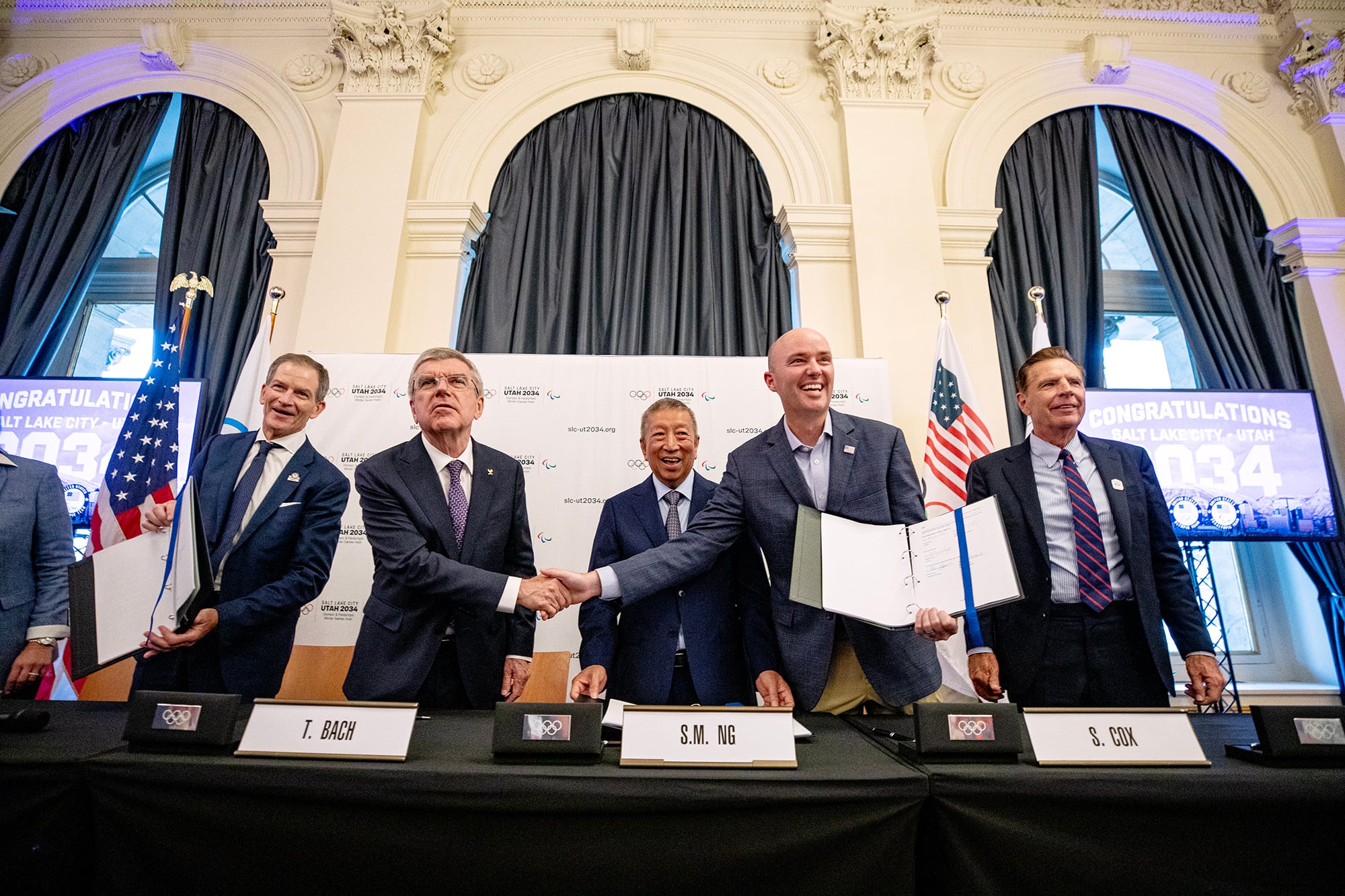 Utah Gov. Spencer Cox shakes hands with International Olympic Committee President Thomas Bach during a private celebration held at USA House during the 2024 Summer Olympics, July 24 in Paris, France.