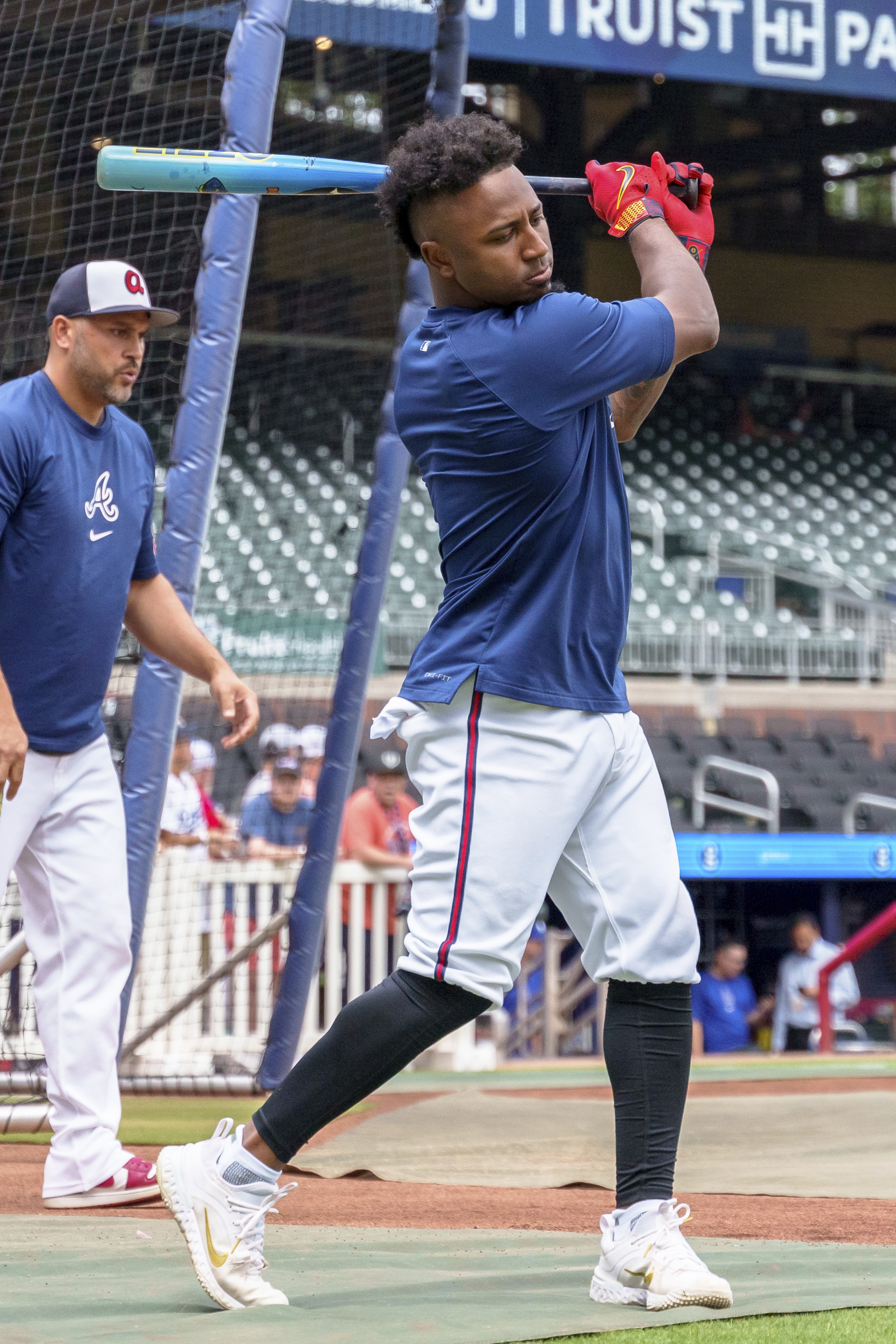 Atlanta Braves second baseman Ozzie Albies practices his swing during batting practice prior to the start of a baseball game against the Los Angeles Dodgers, Sunday, Sept. 15, 2024, in Atlanta.