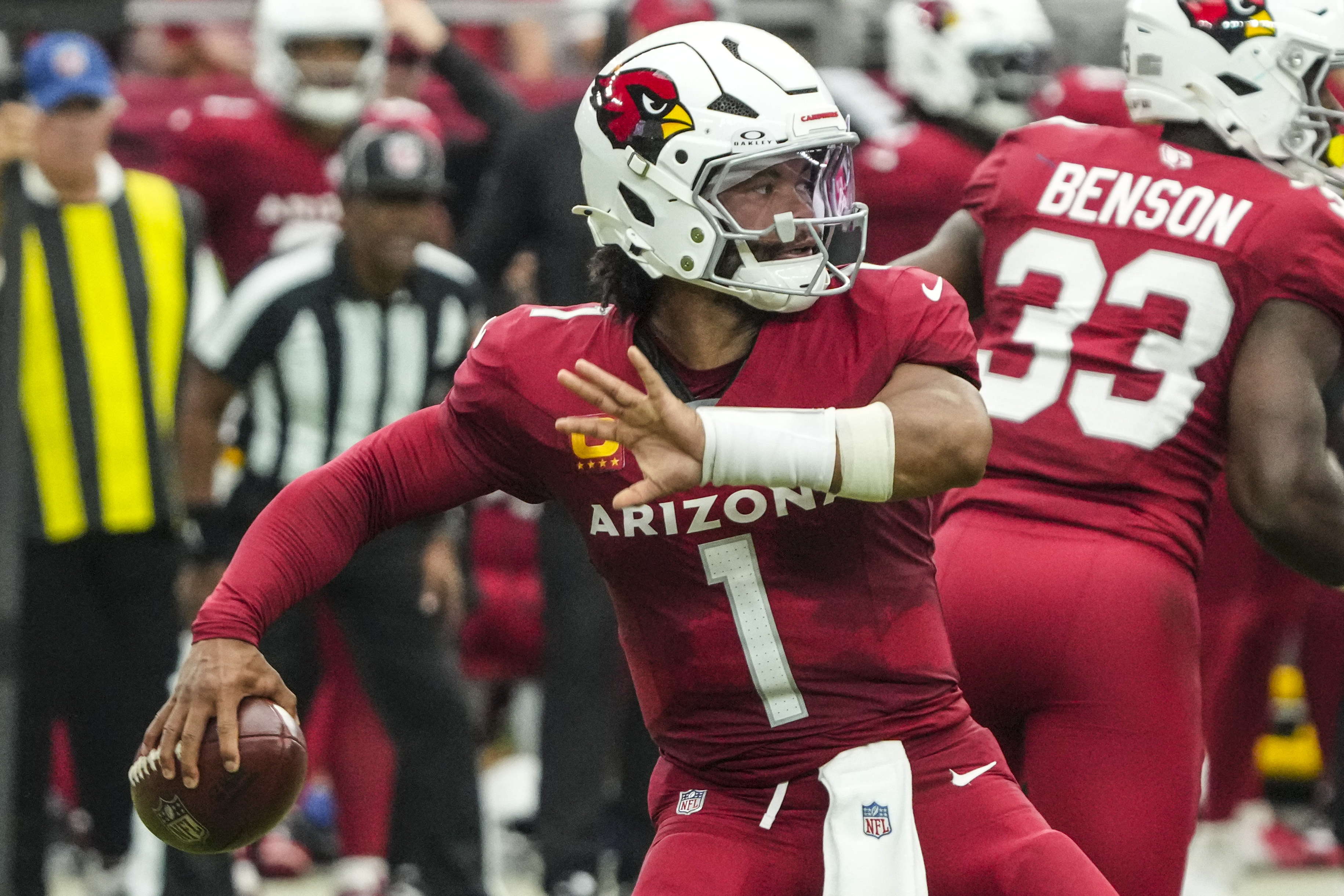 Arizona Cardinals quarterback Kyler Murray (1) works in the pocket against the Los Angeles Rams during the first half of an NFL football game, Sunday, Sept. 15, 2024, in Glendale, Ariz.
