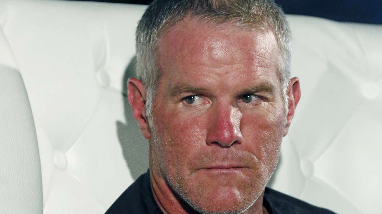 FILE - Retired NFL quarterback Brett Favre participates in a question and answer session at a fundraiser for Willowood Developmental Center, a facility that provides training and assistance for special needs students, Wednesday, Oct. 17, 2018 in Jackson, Miss.