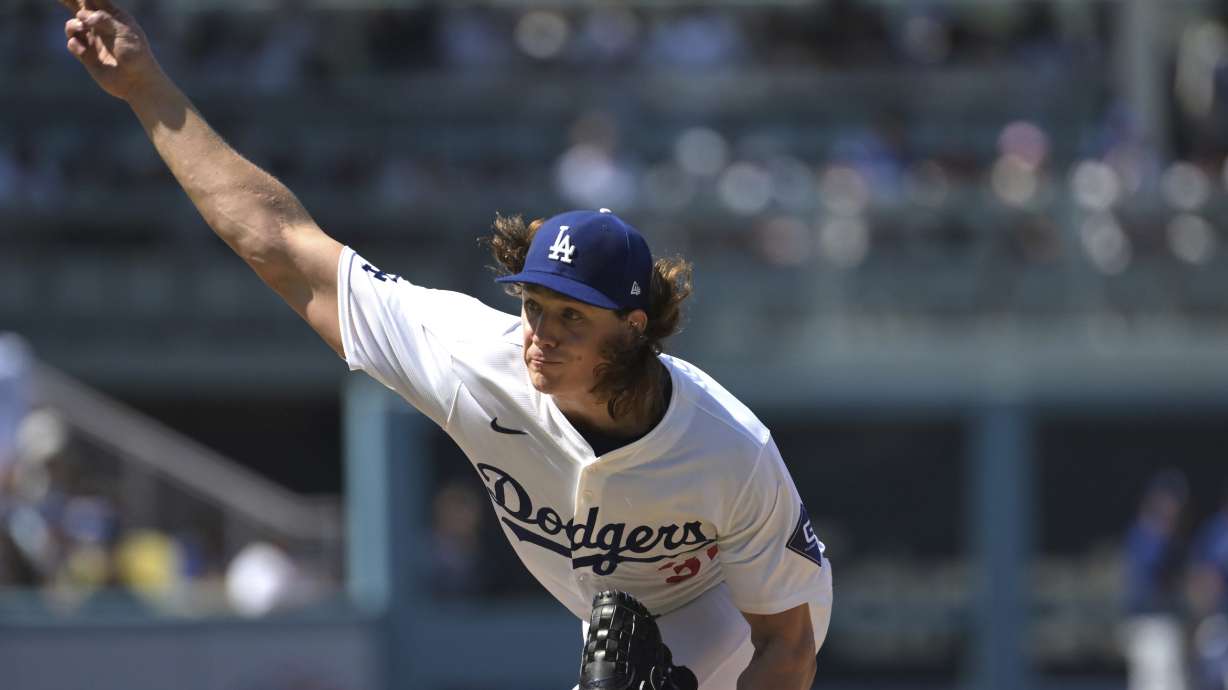 FILE - Los Angeles Dodgers' Tyler Glasnow delivers to the plate against the Pittsburgh Pirates during a baseball game Aug. 11, 2024, in Los Angeles.