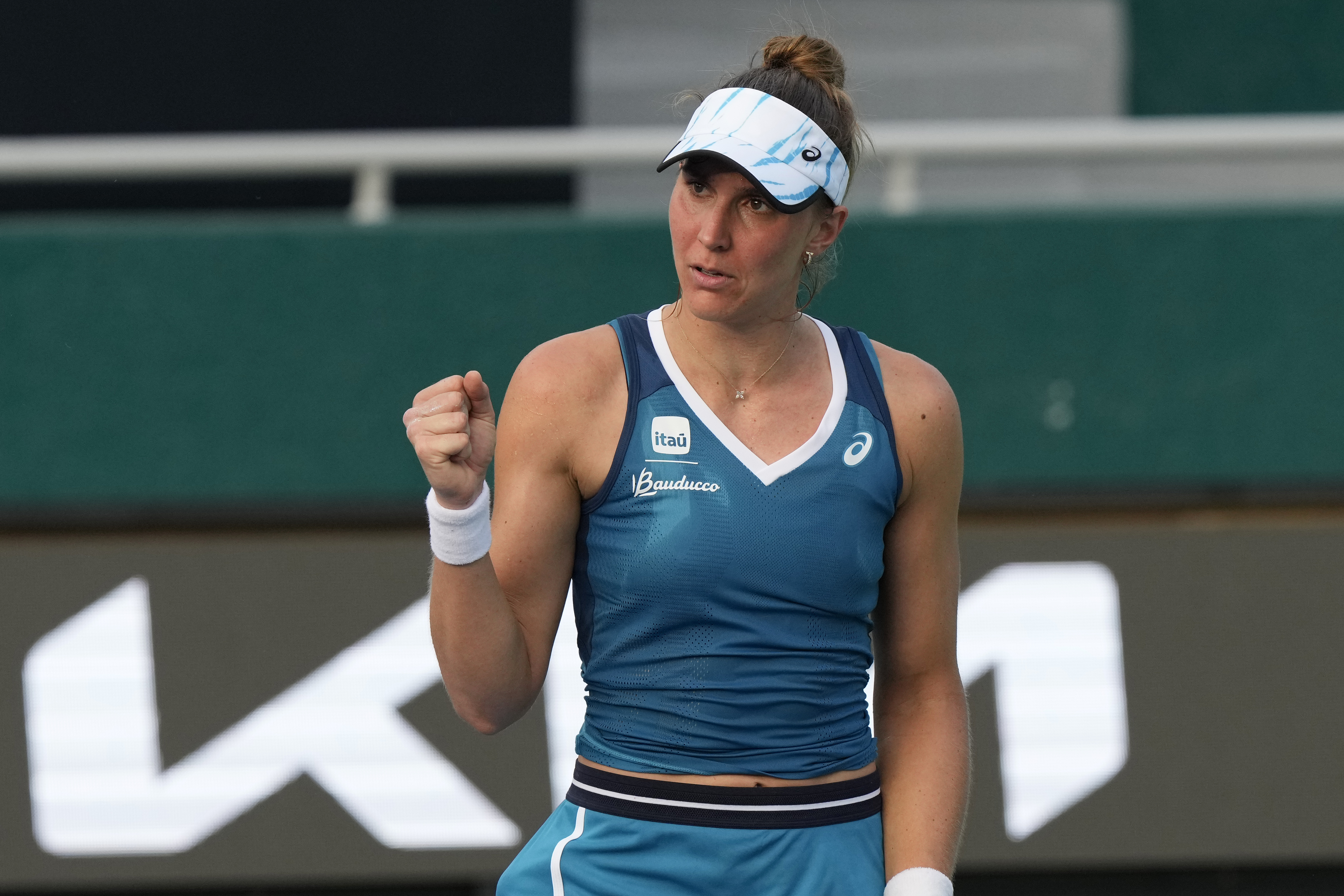 Beatriz Haddad Maia of Brazil reacts after a play against Ajla Tomljanovic of Australia during their quarterfinal match at the Korea Open tennis championships in Seoul, South Korea, Thursday, Sept. 19, 2024. 