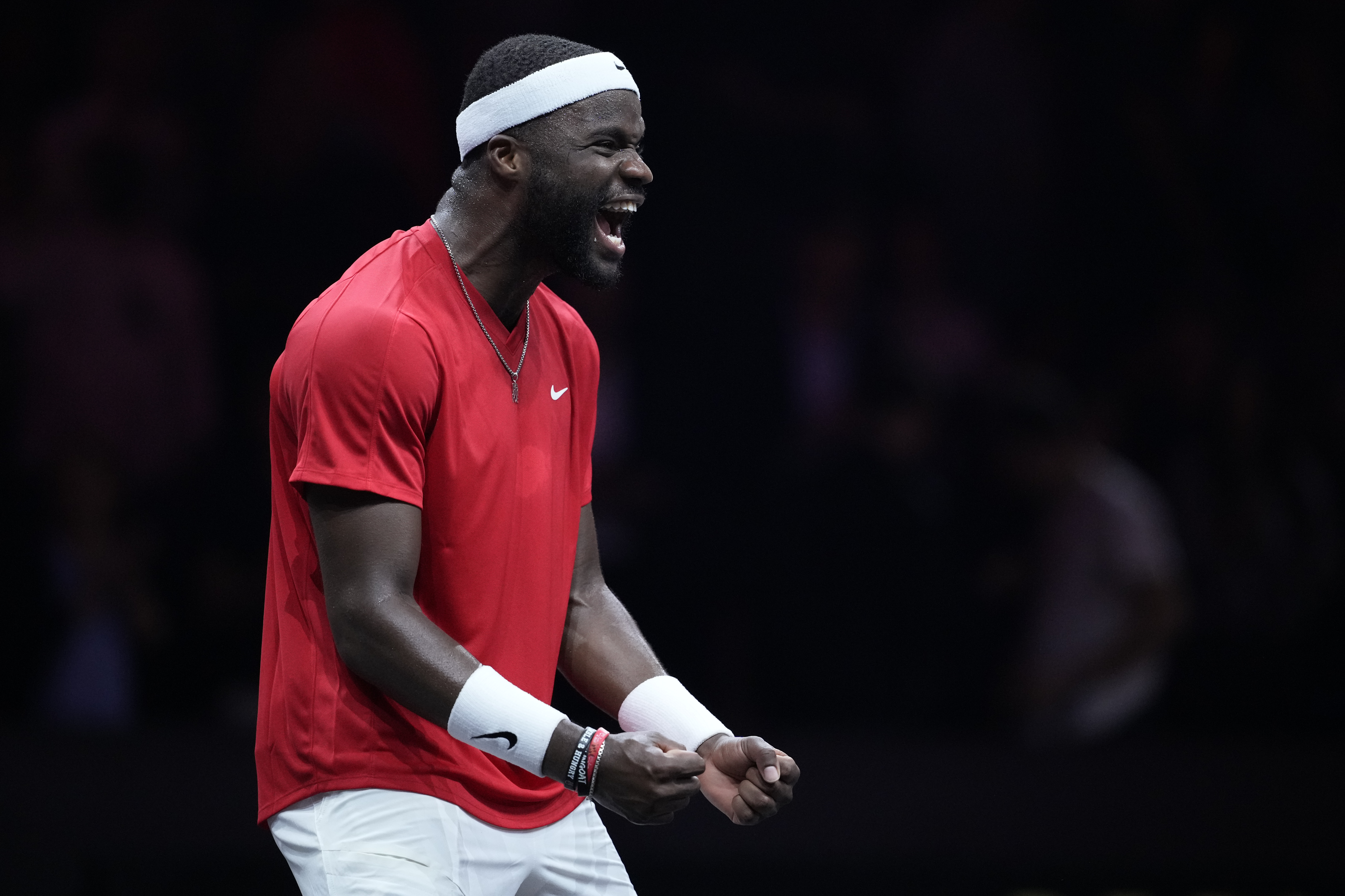 Team World's Frances Tiafoe celebrates after he beat =med- on the second day of the Laver Cup tennis tournament at the Uber arena in Berlin, Germany, Saturday, Sept. 21, 2024.