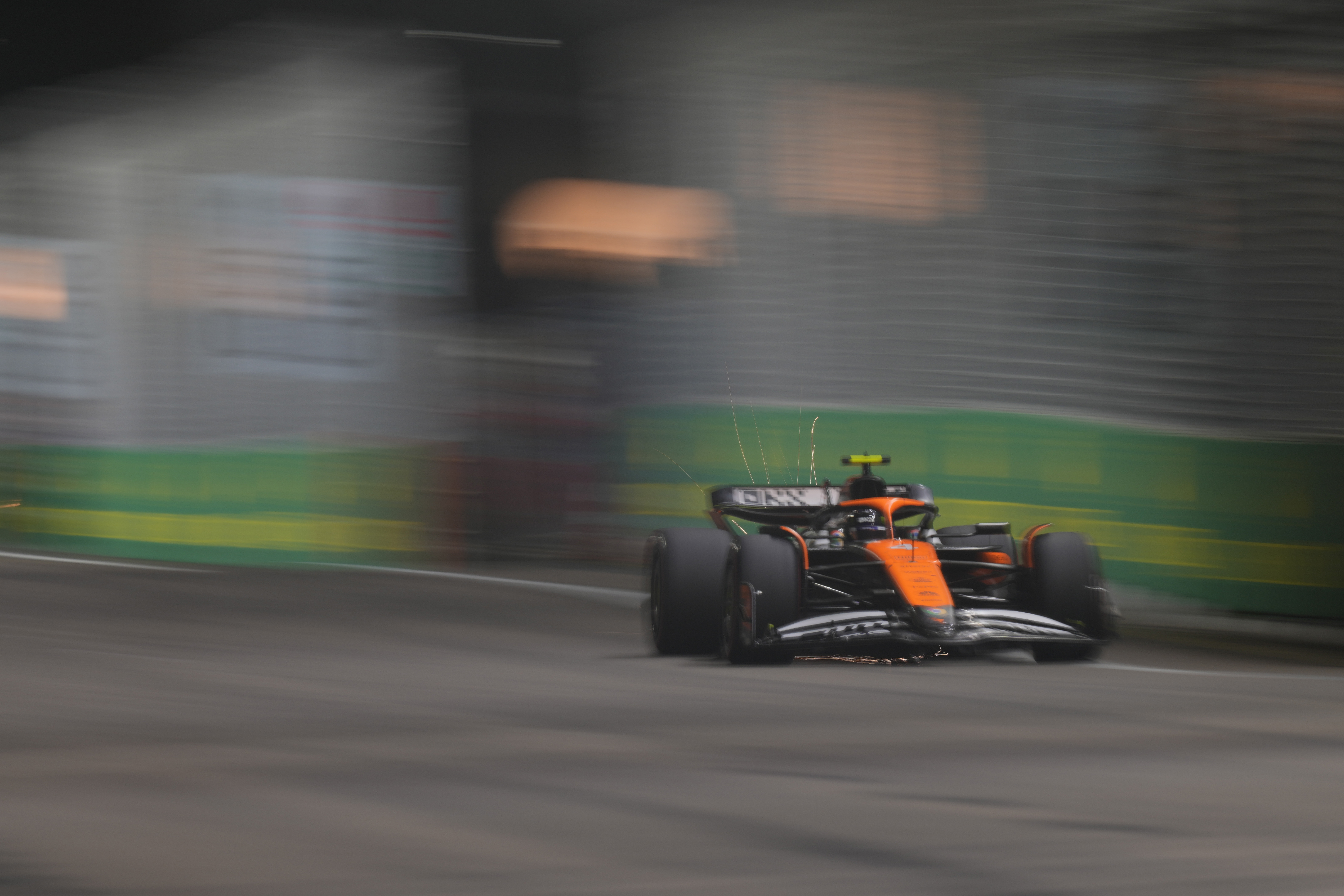 McLaren driver Lando Norris of Britain steers his car during the qualifying session of the Singapore Formula One Grand Prix at the Marina Bay Street Circuit, in Singapore, Saturday, Sept. 21, 2024. 
