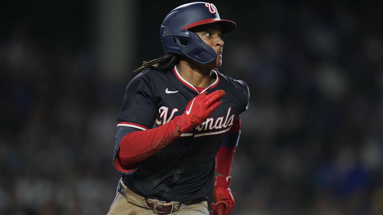 Washington Nationals' CJ Abrams runs the bases on a double during the third inning of a baseball game against the Chicago Cubs, Thursday, Sept. 19, 2024, in Chicago.