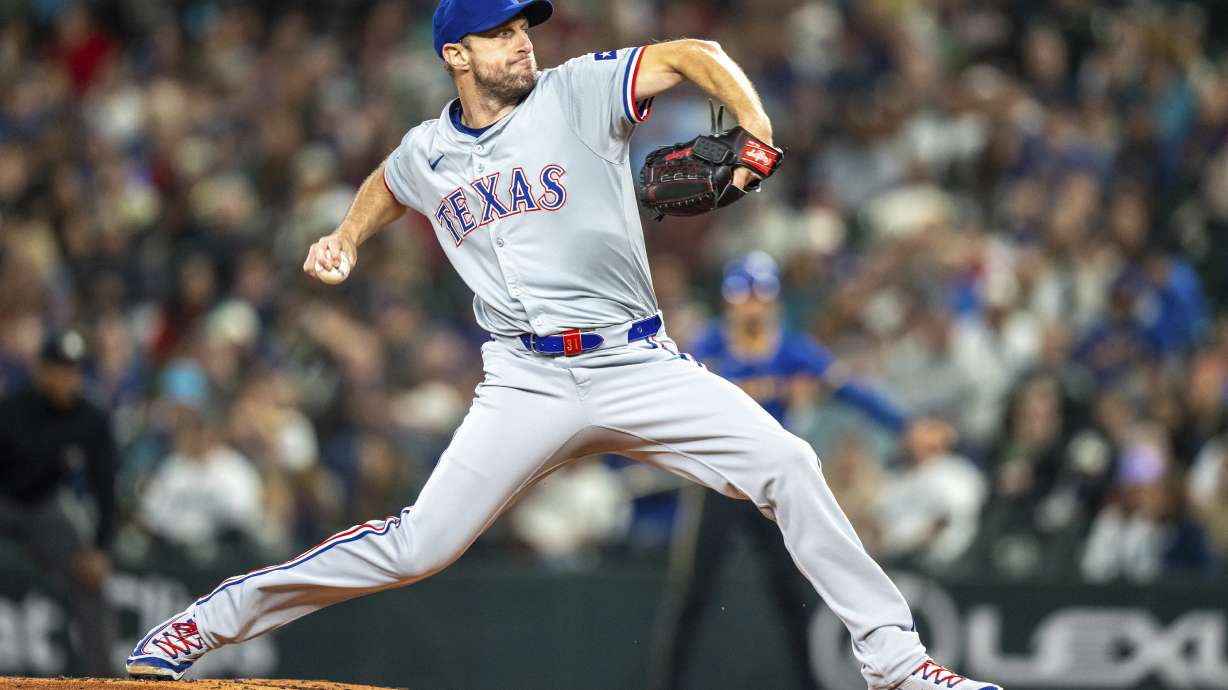 Texas Rangers starter Max Scherzer delivers a pitch during the first inning of a baseball game against the Texas Rangers, Saturday, Sept. 14, 2024, in Seattle.