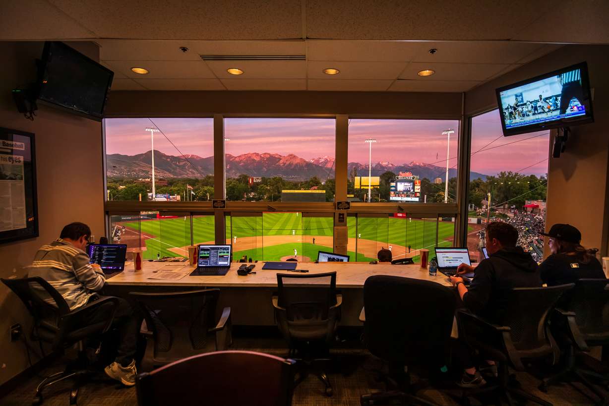The sun sets beyond the Smith's Ballpark press box during a Salt Lake Bees game on June 18.
