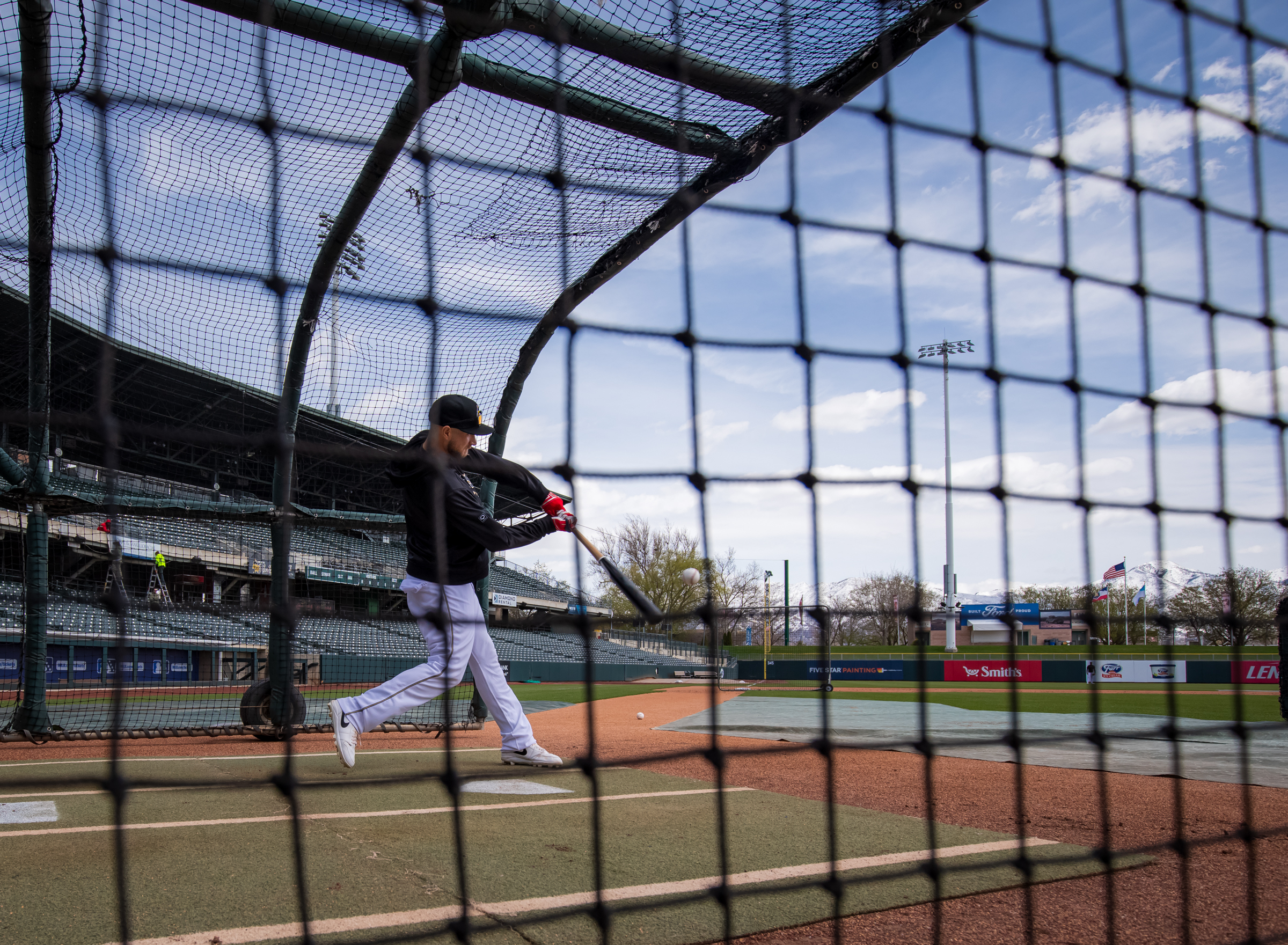 Salt Lake Bees infielder Hunter Dozier swings during batting practice on March 27 before the team's final home opener at Smith's Ballpark.
