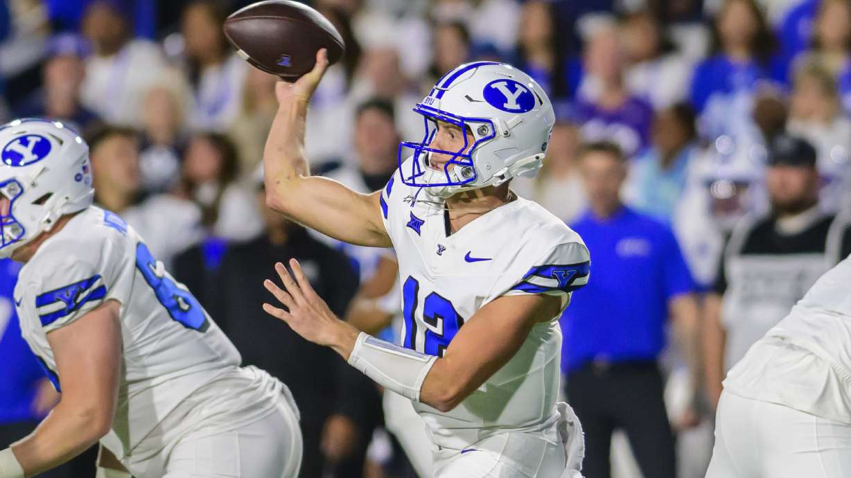 BYU quarterback Jake Retzlaff (12) passes the football during an NCAA college football game against Kansas State, Saturday, Sept. 21, 2024, in Provo, Utah.