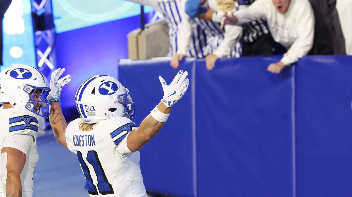 Brigham Young wide receiver Parker Kingston (11) celebrates his touchdown on a punt return in Provo on Saturday, Sept. 21, 2024. BYU won 38-9.
