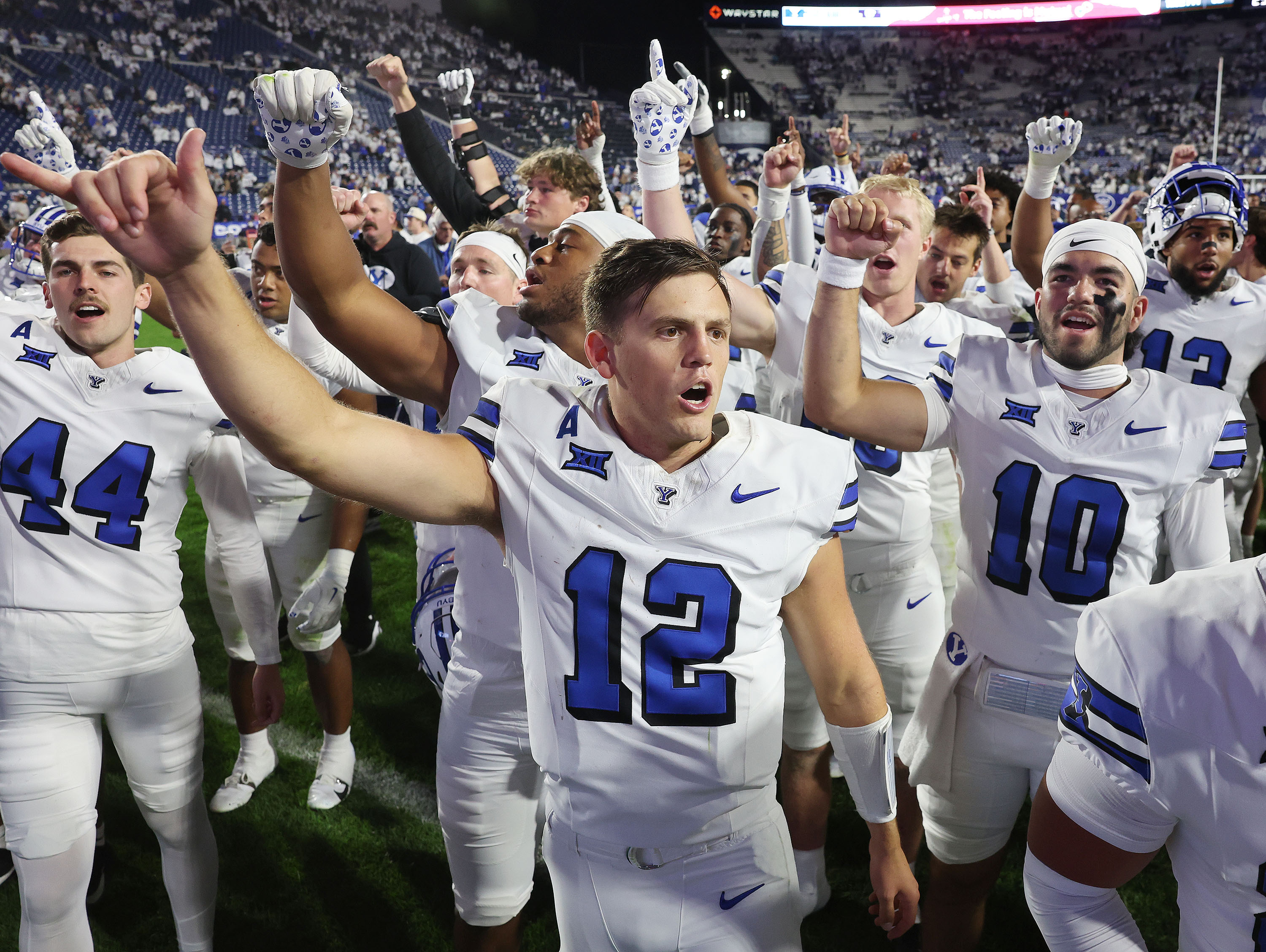 BYU quarterback Jake Retzlaff celebrates a win over Kansas State in Provo on Saturday, Sept. 21, 2024. BYU won 38-9.