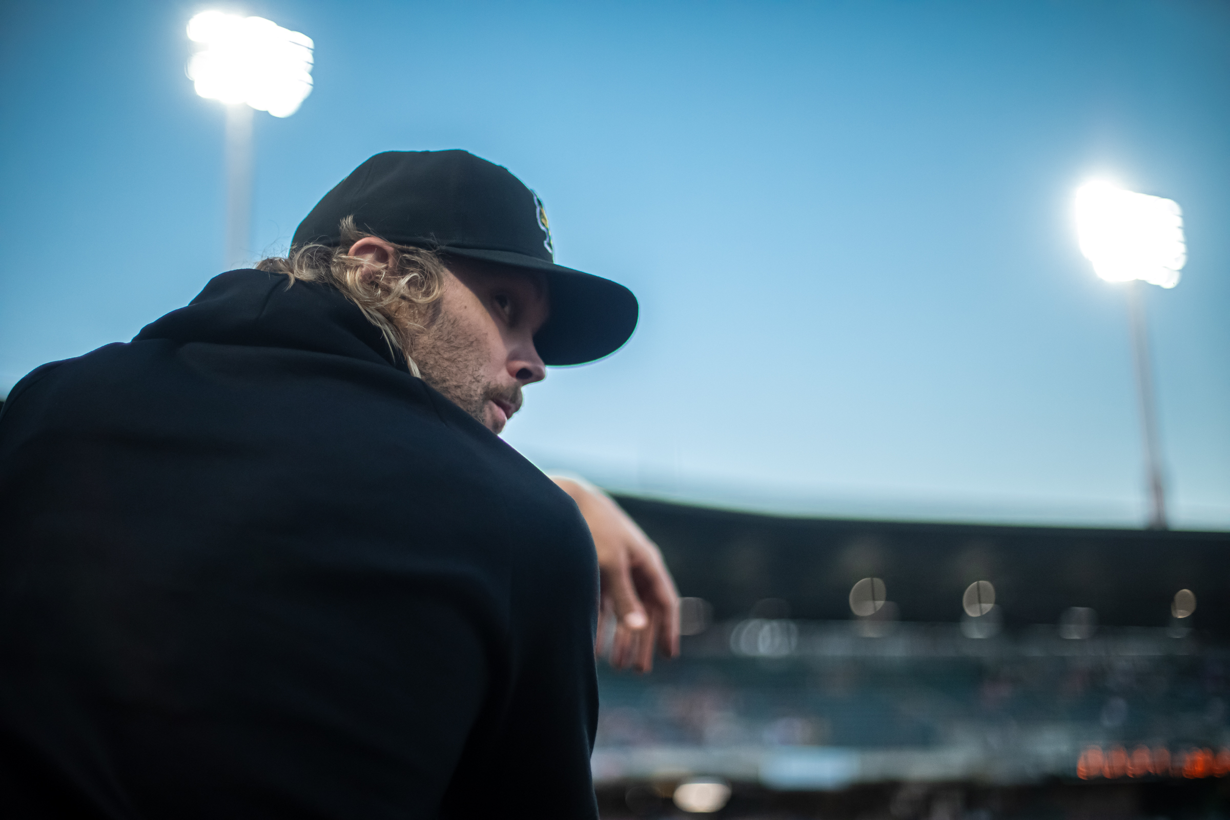Salt Lake Bees relief pitcher Adam Cimber watches a Bees game from the Smith's Ballpark dugout on Sept. 6.