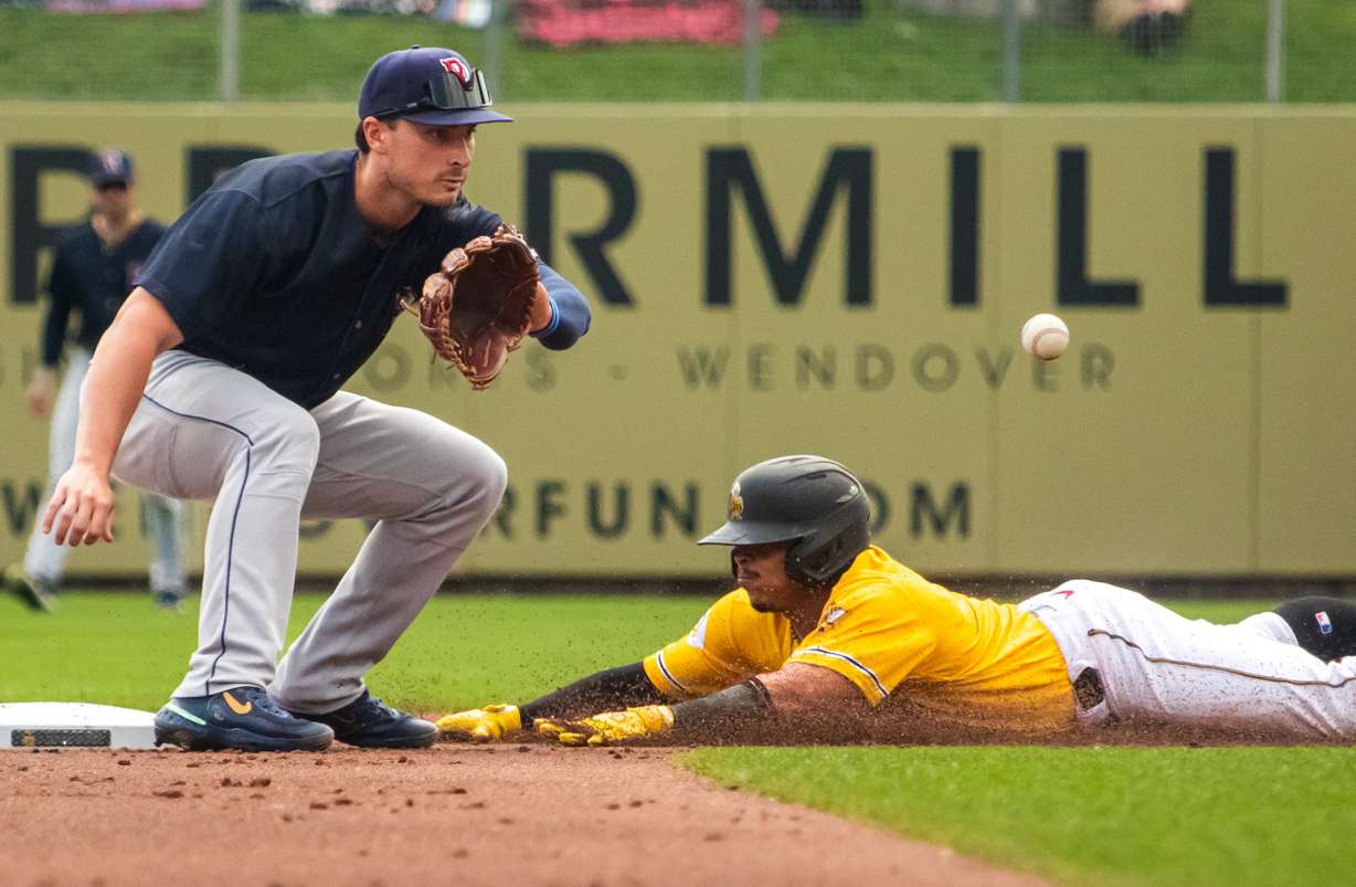 Salt Lake Bees outfielder Gustavo Campero steals a baseball during the team's 14-4 win over Round Rock on Aug. 25.