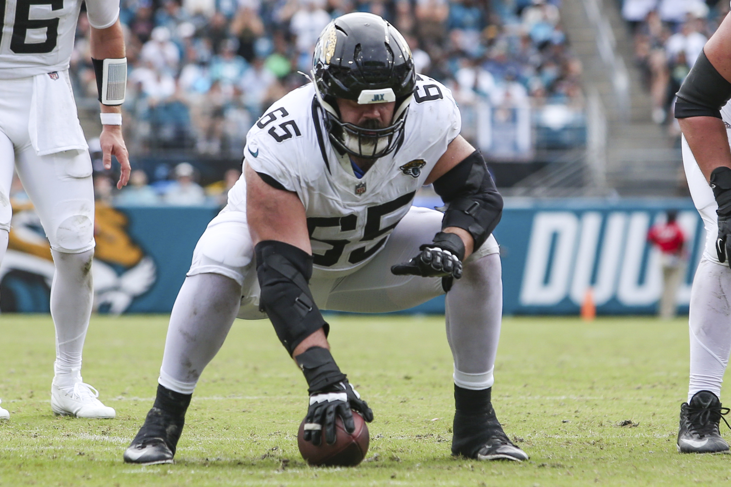 FILE - Jacksonville Jaguars center Mitch Morse (65) sets to snap the ball during an NFL football game against the Cleveland Browns in Jacksonville, Fla., Sept. 15, 2024. The Browns defeated the Jaguars 18-13. 
