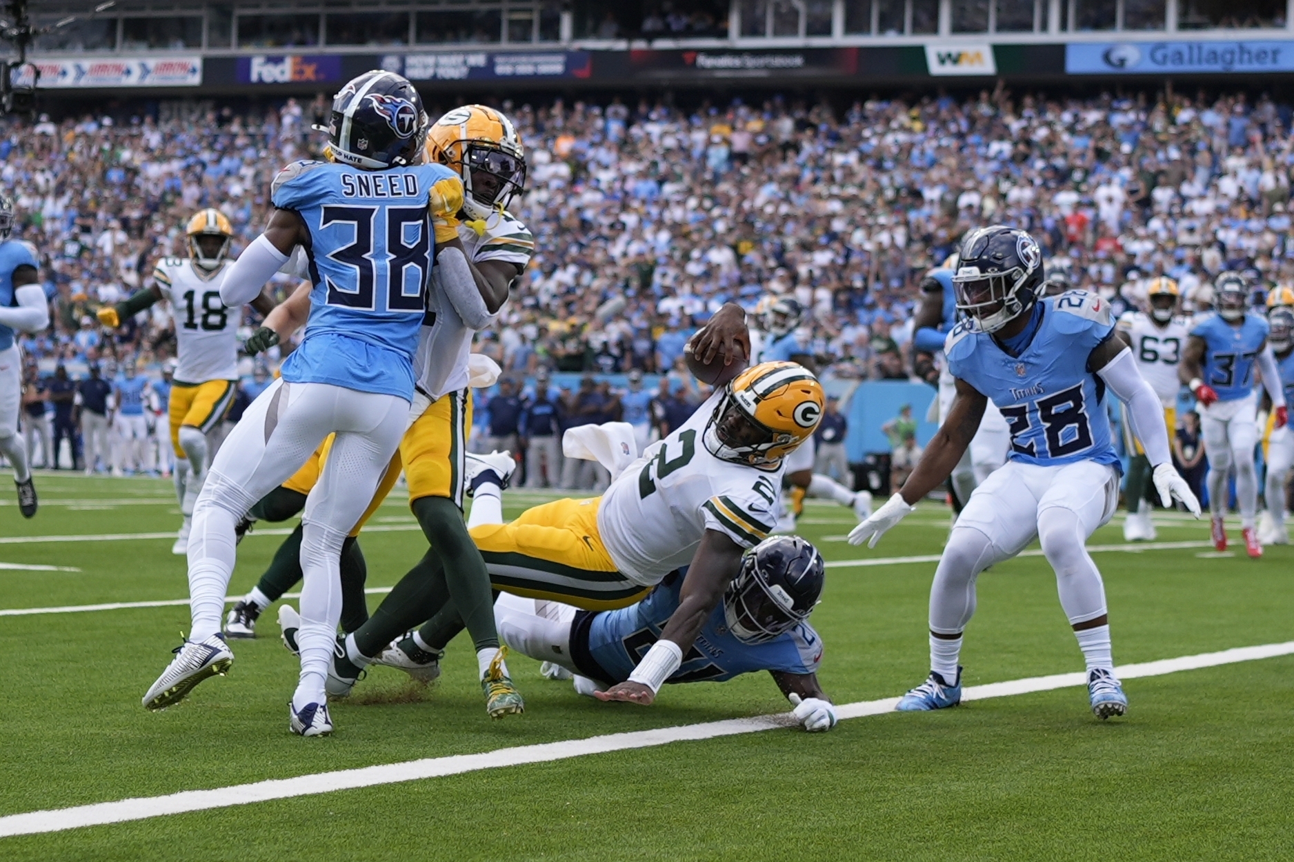 Green Bay Packers' Malik Willis runs for a touchdown during the first half of an NFL football game against the Tennessee Titans Sunday, Sept. 22, 2024, in Nashville, Tenn. 