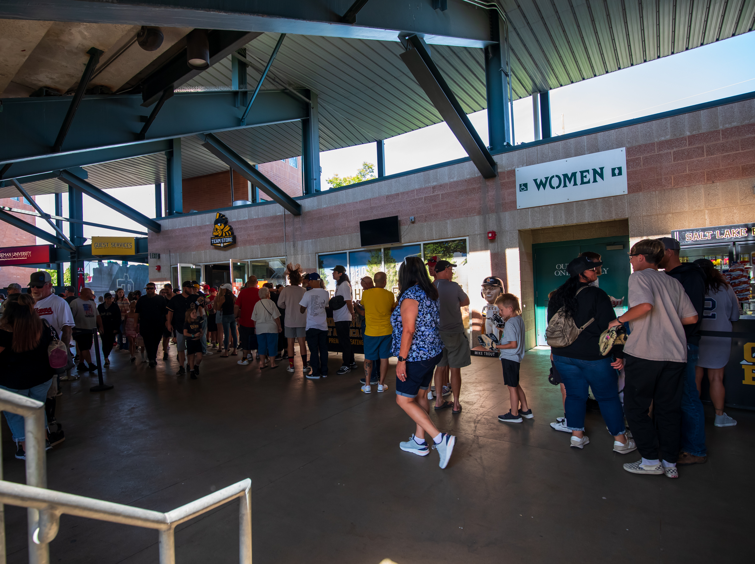 A line forms outside the Salt Lake Bees Store at Smith's Ballpark before the team's final game at the ballpark on Sunday.