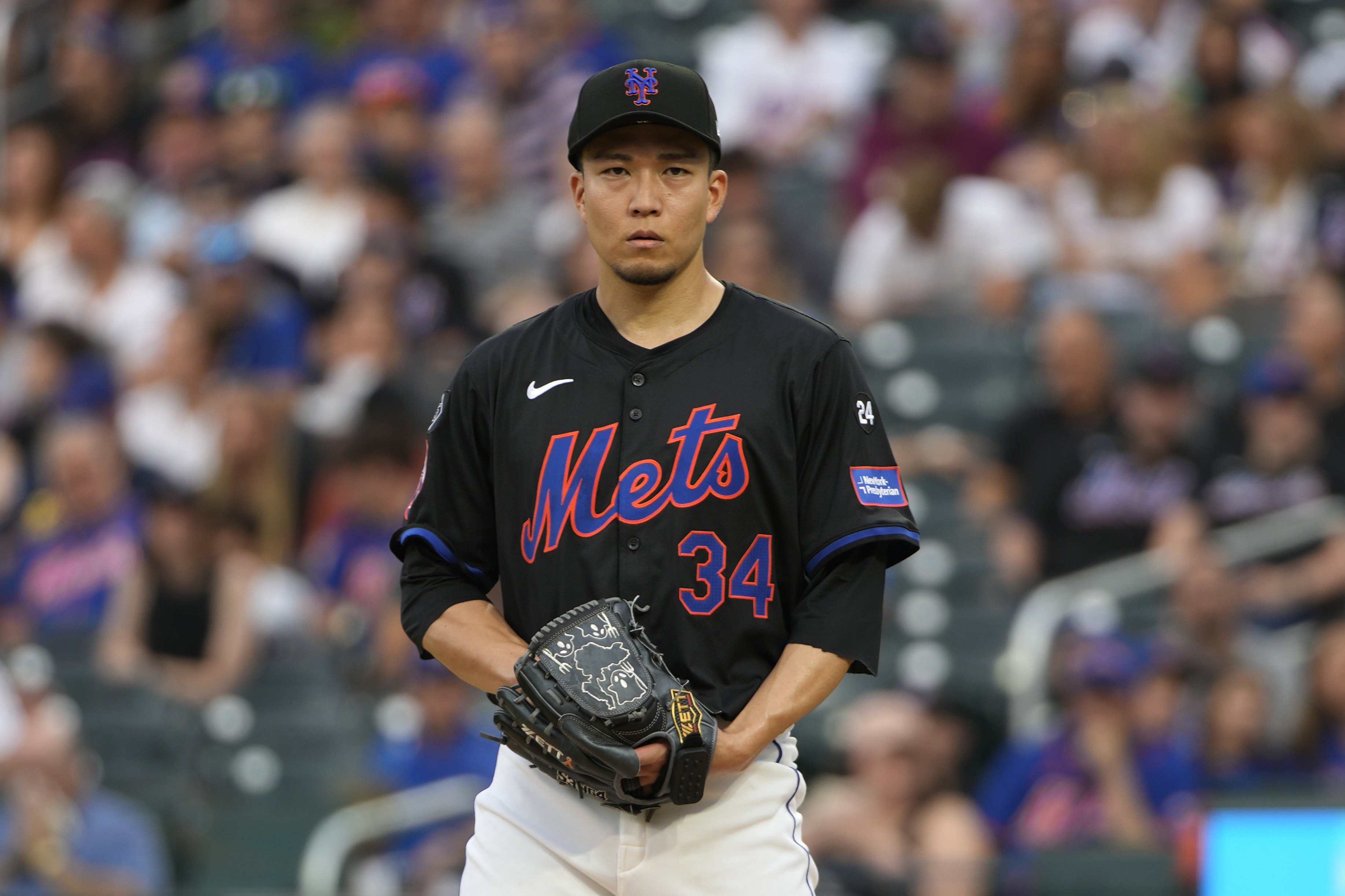 FILE - New York Mets' Kodai Senga prepares to pitch during the first inning of a baseball game against the Atlanta Braves, July 26, 2024, in New York. 