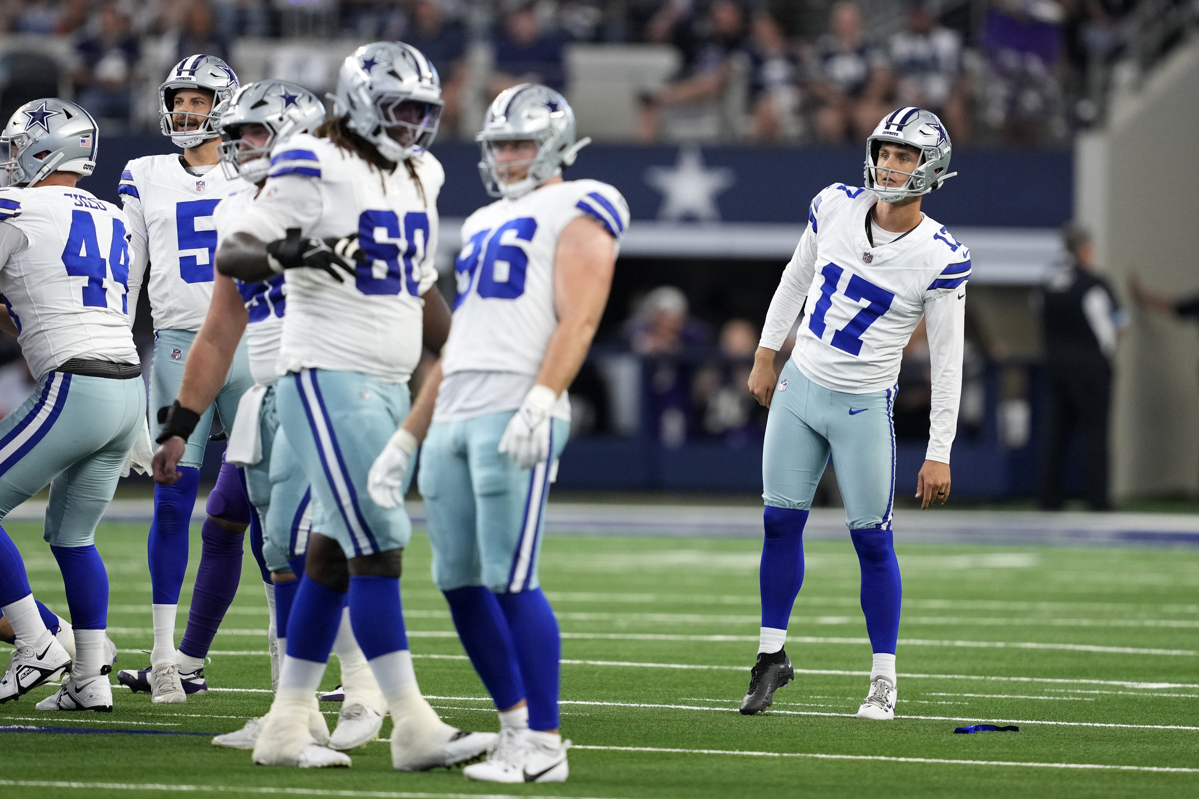 Dallas Cowboys' Brandon Aubrey (17) and the rest of the line watch Aubrey's 65-yard field goal go through the uprights in the first half of an NFL football game against the Baltimore Ravens in Arlington, Texas, Sunday, Sept. 22, 2024. 