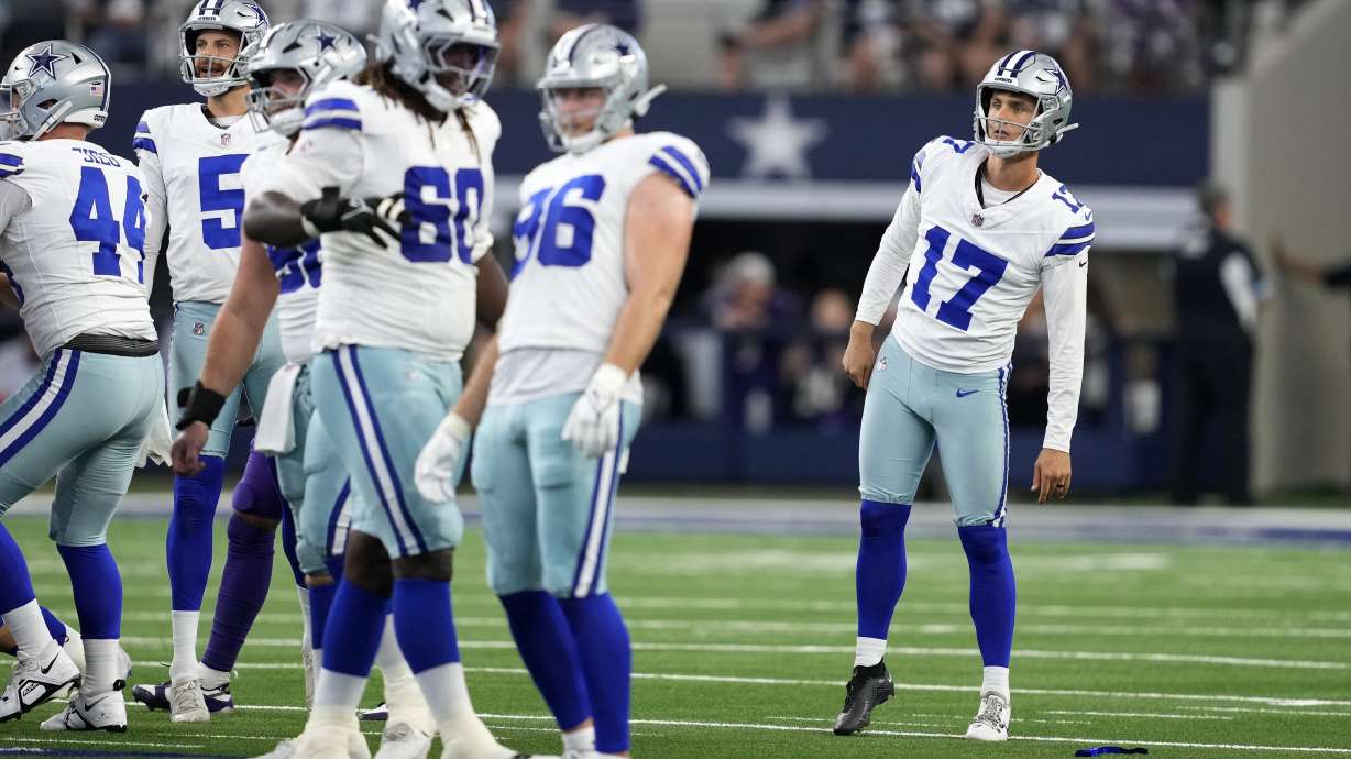 Dallas Cowboys' Brandon Aubrey (17) and the rest of the line watch Aubrey's 65-yard field goal go through the uprights in the first half of an NFL football game against the Baltimore Ravens in Arlington, Texas, Sunday, Sept. 22, 2024.