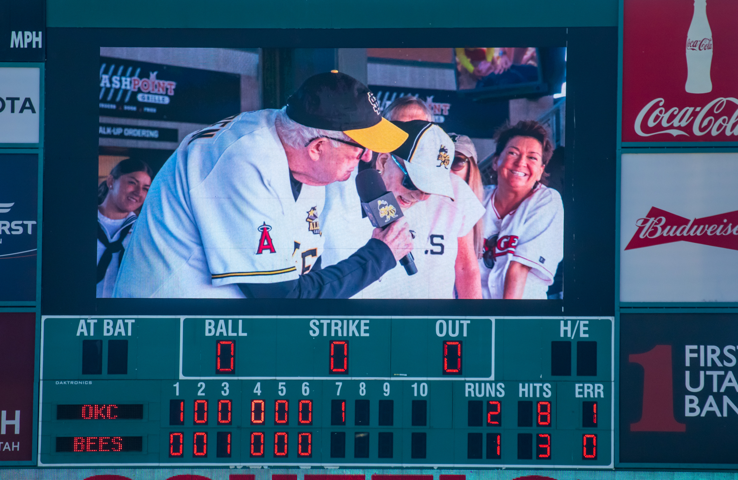 Former Utah Jazz coach Frank Layden is pictured on the video scoreboard leading fans in the last "Take Me Out to the Ball Game" singing during a Salt Lake Bees Smith's Ballpark on Sunday.