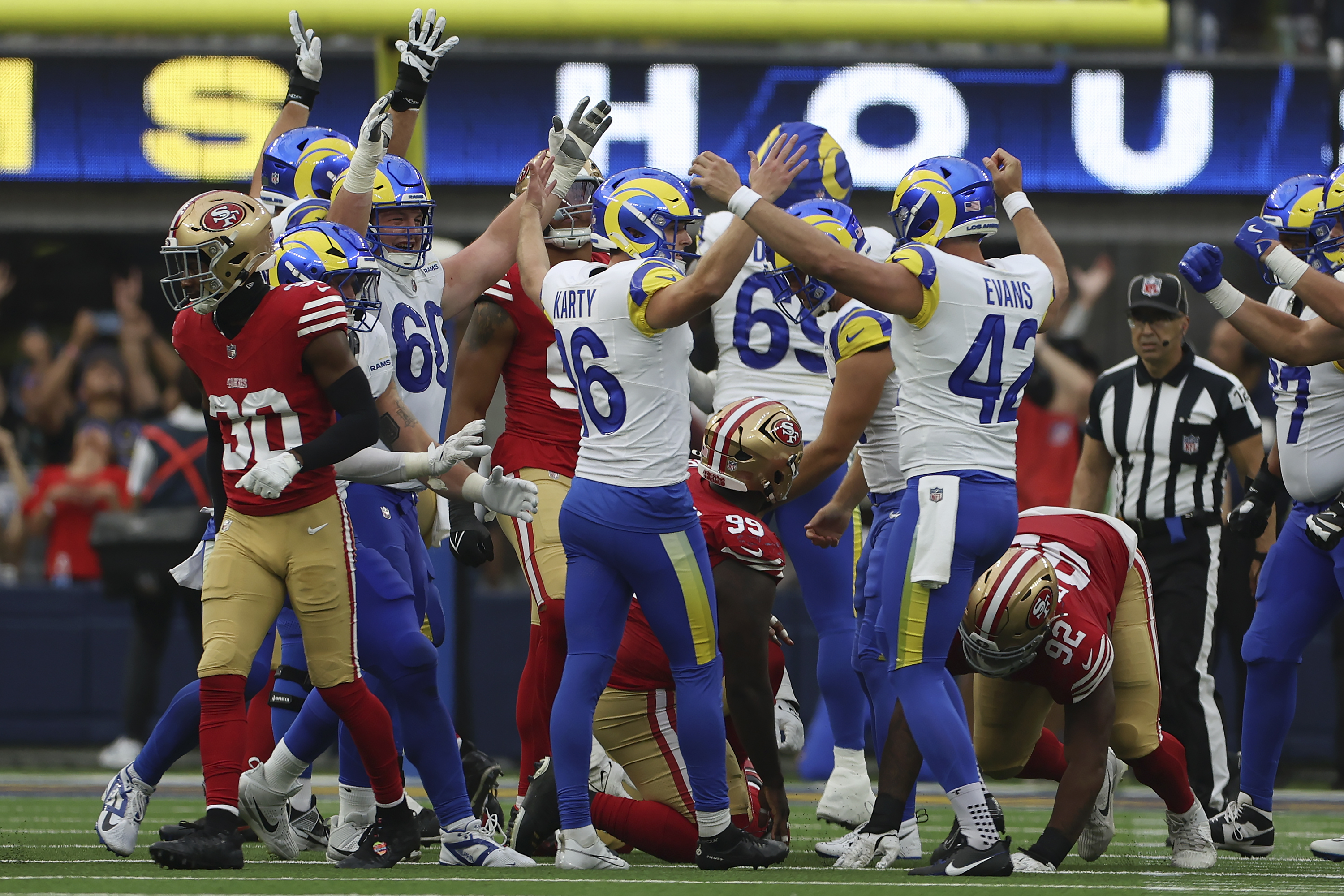 Los Angeles Rams place kicker Joshua Karty (16) celebrates with teammates after kicking a field goal against the San Francisco 49ers during the second half of an NFL football game, Sunday, Sept. 22, 2024, in Inglewood, Calif.