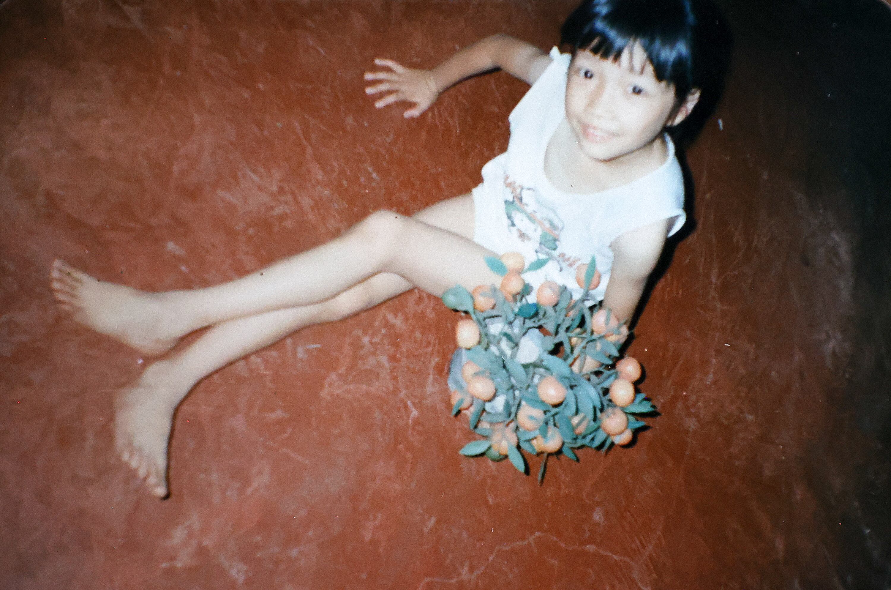 Amy Sunderland was underweight as a 5 or 6-year-old in this family photo. Sunderland grew up very poor, with dirt floors, no electricity and no running water in Hunan province, China.