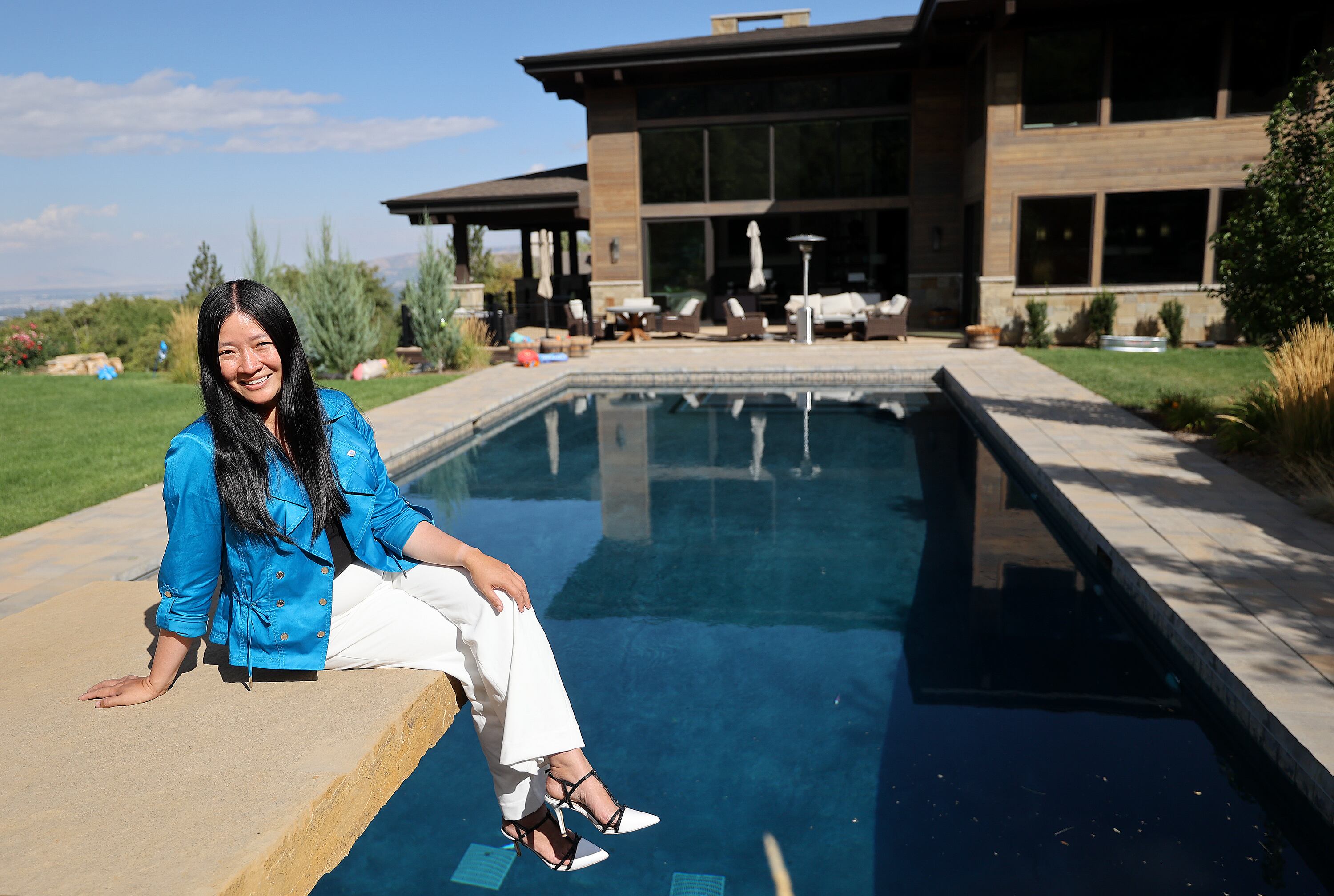 Amy Sunderland poses for a portrait outside her home in Millcreek on Sept. 12. 