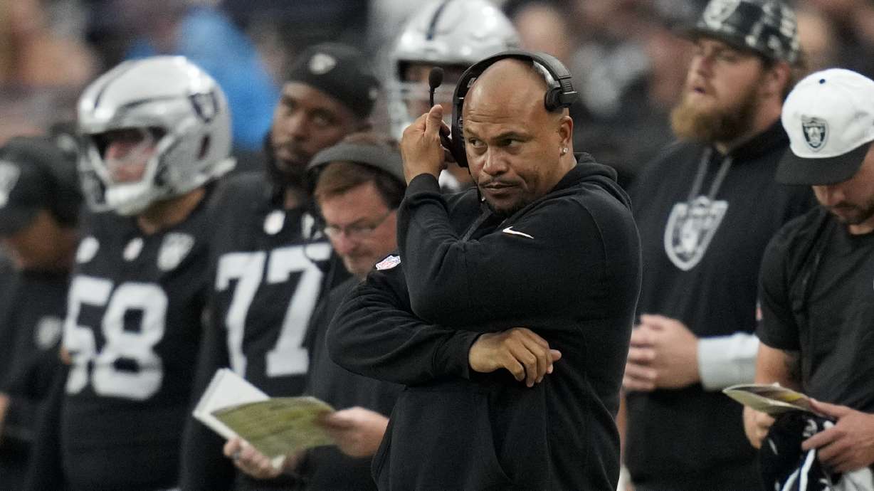 Las Vegas Raiders head coach Antonio Pierce watches during the second half of an NFL football game against the Carolina Panthers, Sunday, Sept. 22, 2024, in Las Vegas.