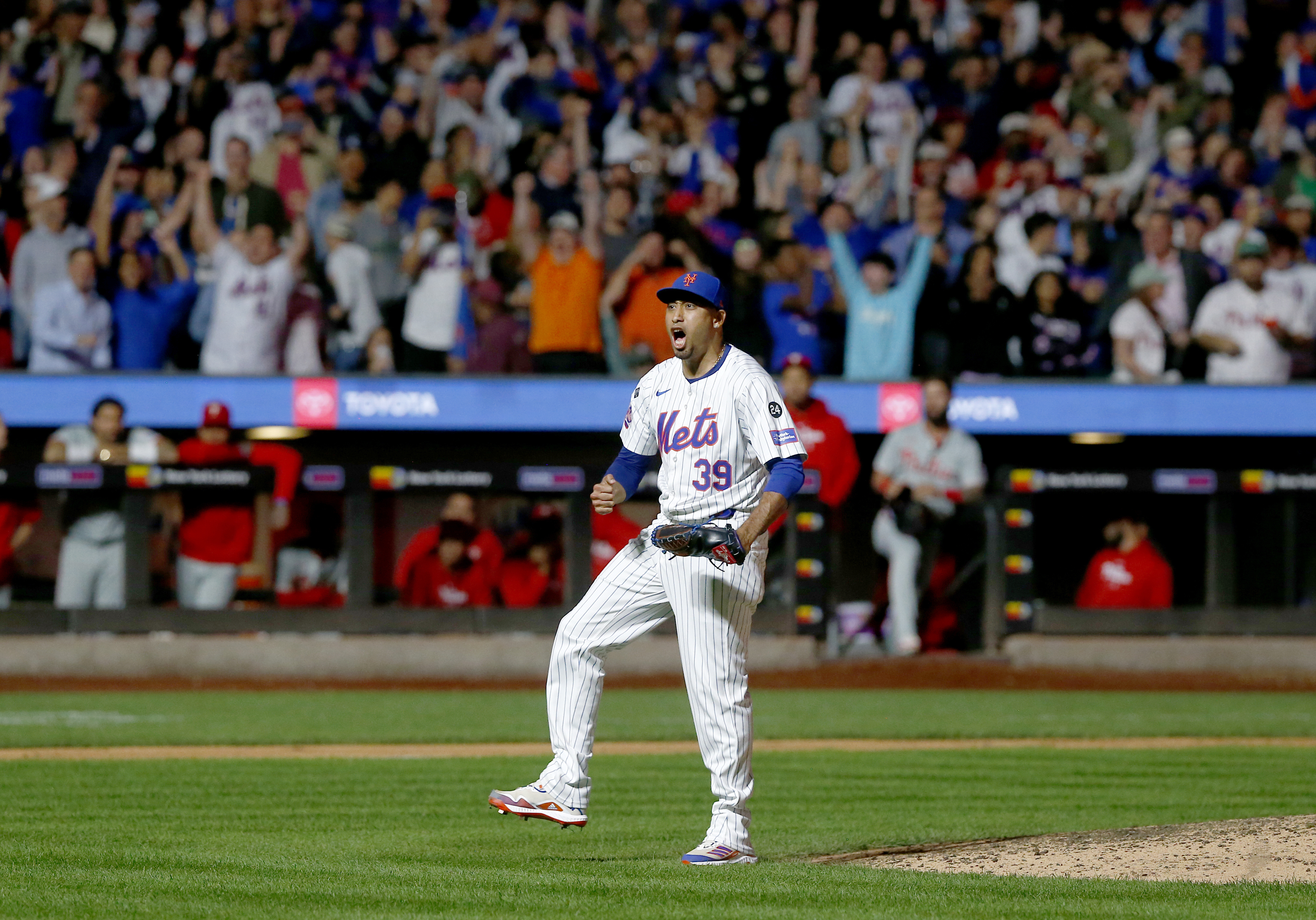 New York Mets relief pitcher Edwin Diaz reacts after striking out Kody Clemens for the final out during a baseball game against the Philadelphia Phillies, Sunday, Sept. 22, 2024, in New York. 