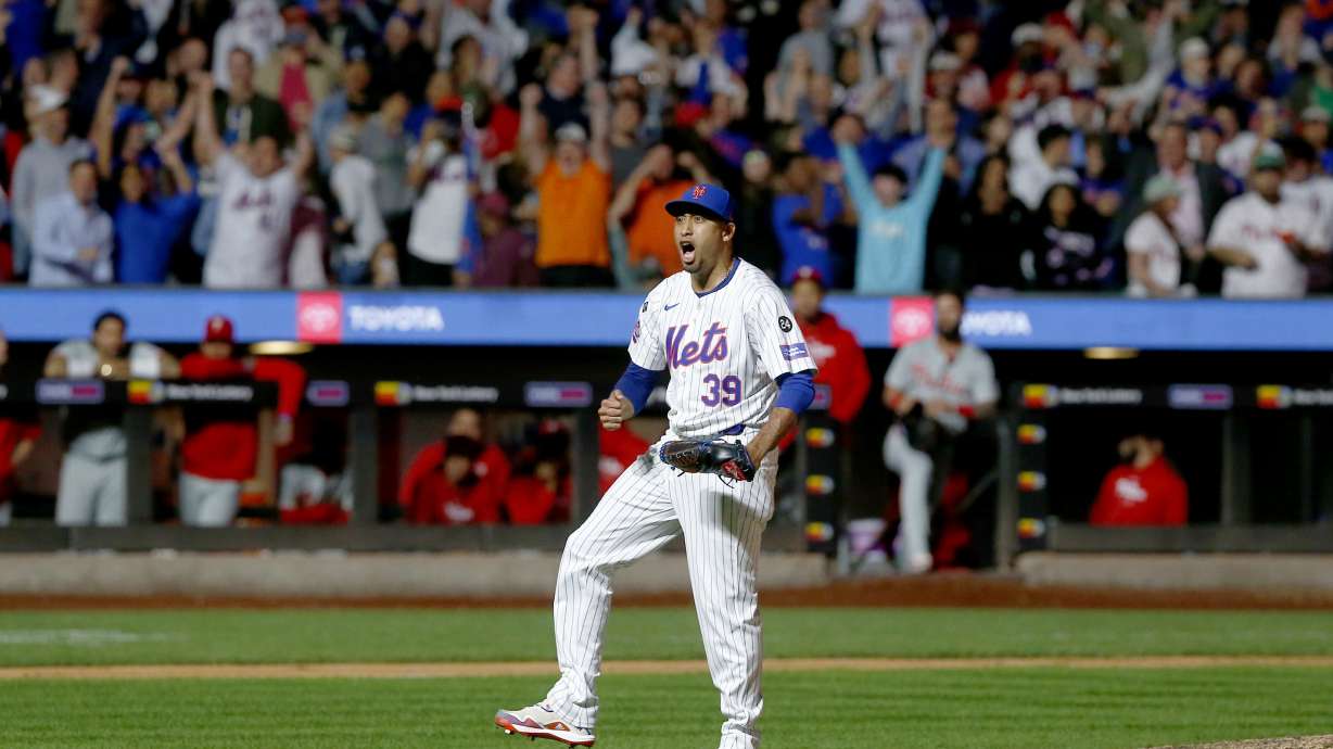 New York Mets relief pitcher Edwin Diaz reacts after striking out Kody Clemens for the final out during a baseball game against the Philadelphia Phillies, Sunday, Sept. 22, 2024, in New York.