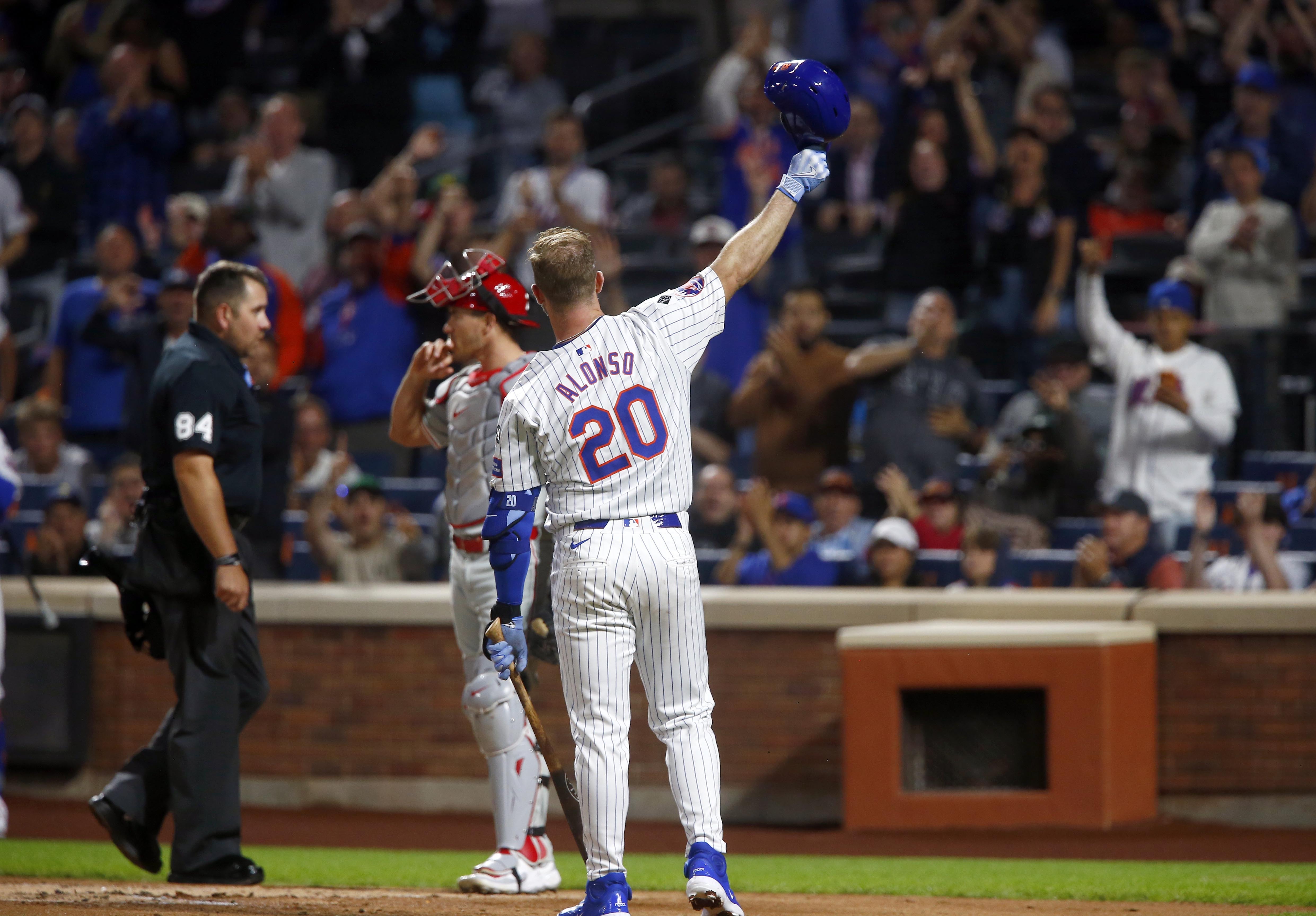 New York Mets batter Pete Alonso waves to the fans as he steps to the plate in the first inning during a baseball game against the Philadelphia Phillies, Sunday, Sept. 22, 2024, in New York.