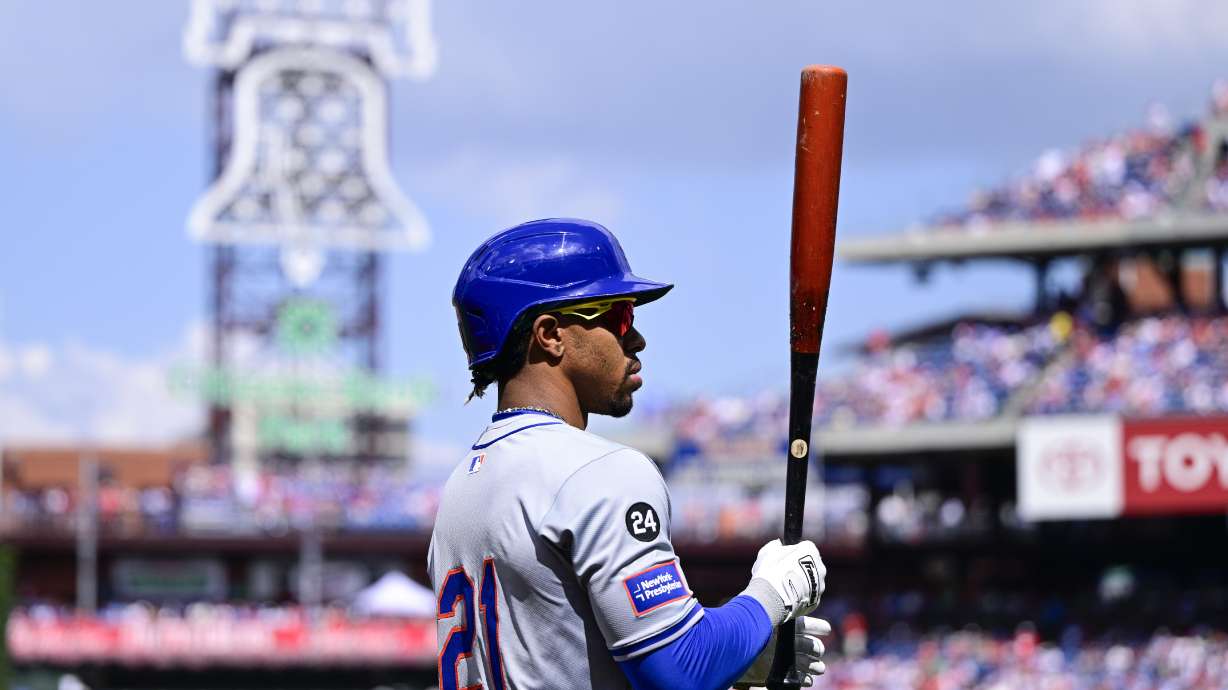New York Mets' Francisco Lindor prepares for an at-bat during the first inning of a baseball game against the Philadelphia Phillies, Sunday, Sept. 15, 2024, in Philadelphia.
