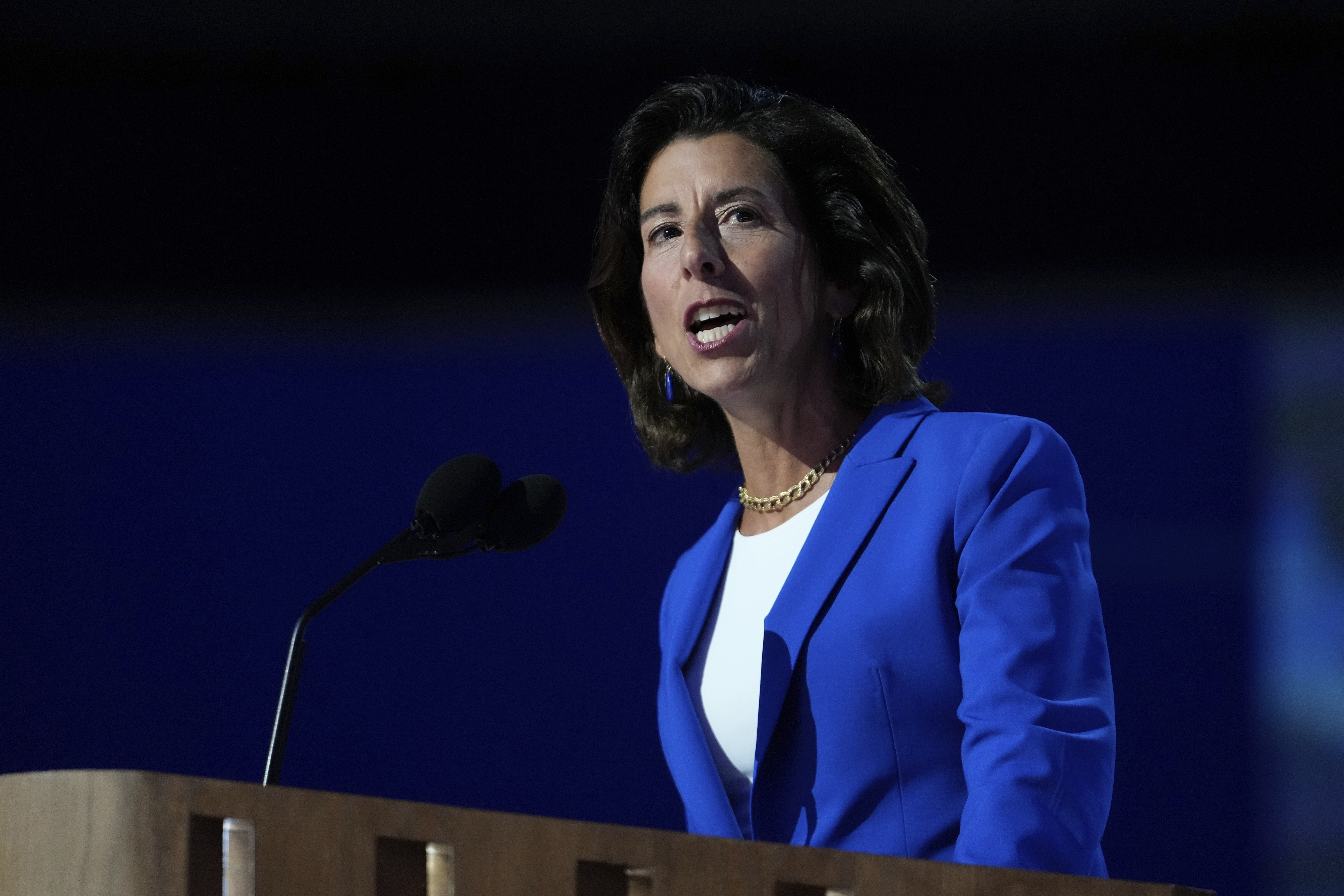Gina Raimondo, U.S. Secretary of Commerce, speaks on Aug. 19 in Chicago. The Commerce Department said Monday it's seeking a ban on the sale of some vehicles with Chinese or Russian software. 
