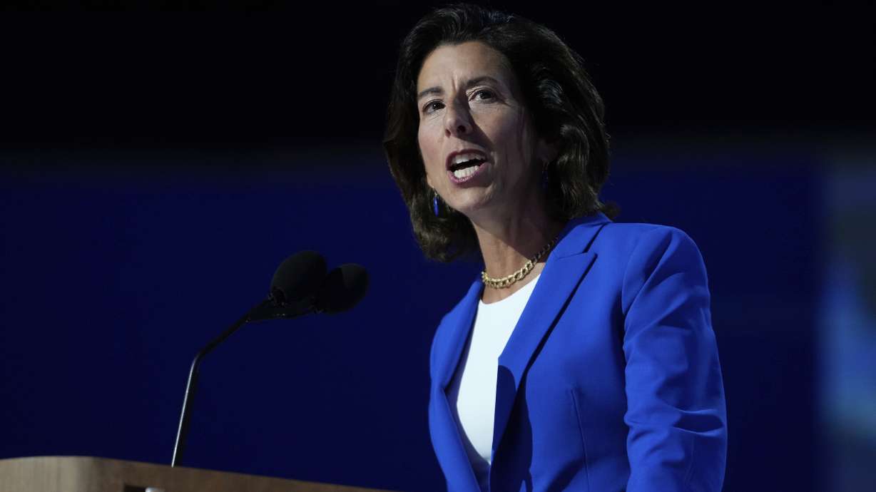 Gina Raimondo, U.S. Secretary of Commerce, speaks on Aug. 19 in Chicago. The Commerce Department said Monday it's seeking a ban on the sale of some vehicles with Chinese or Russian software.