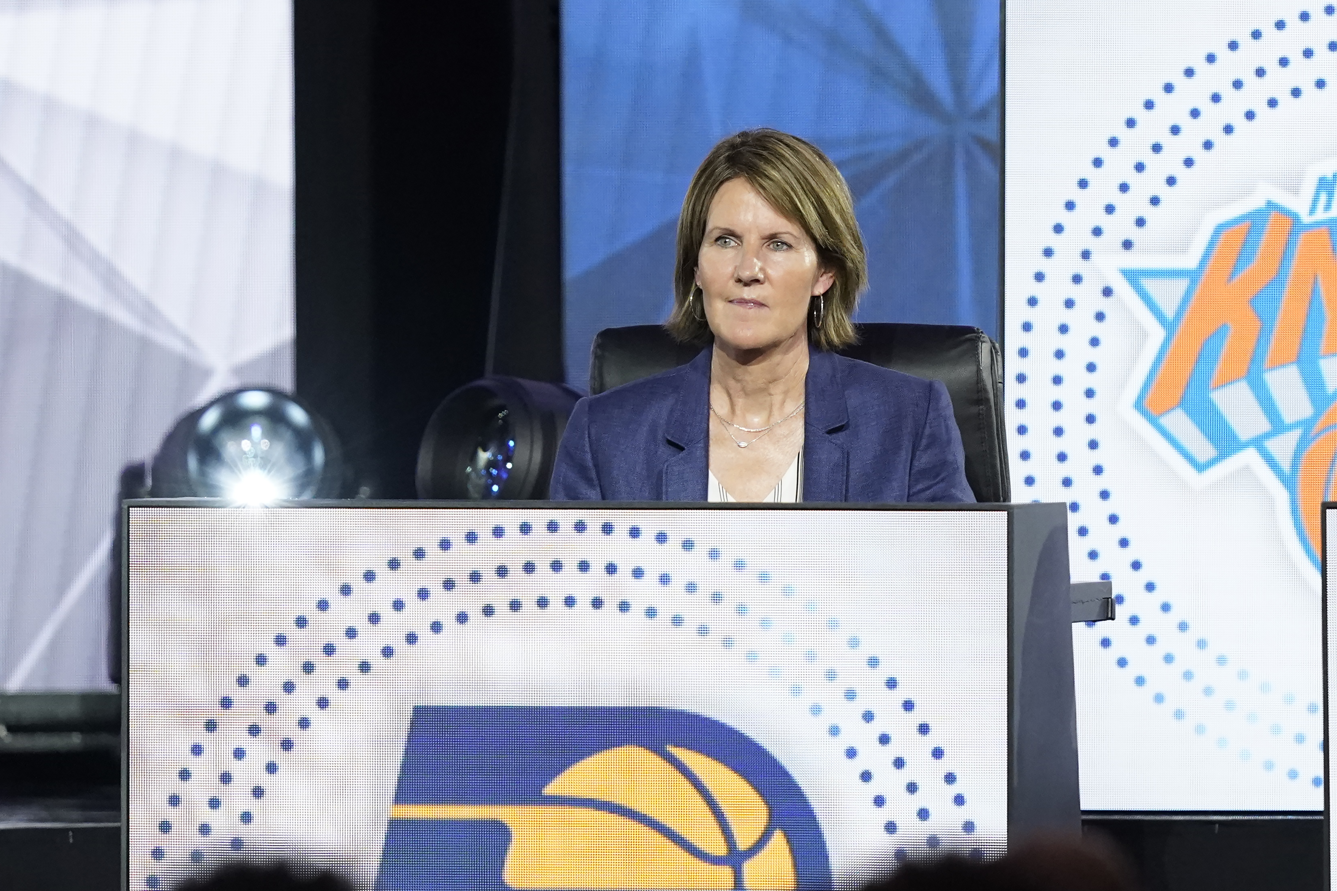 FILE - Kelly Krauskopf sits on stage during the 2022 NBA basketball Draft Lottery, May 17, 2022, in Chicago.