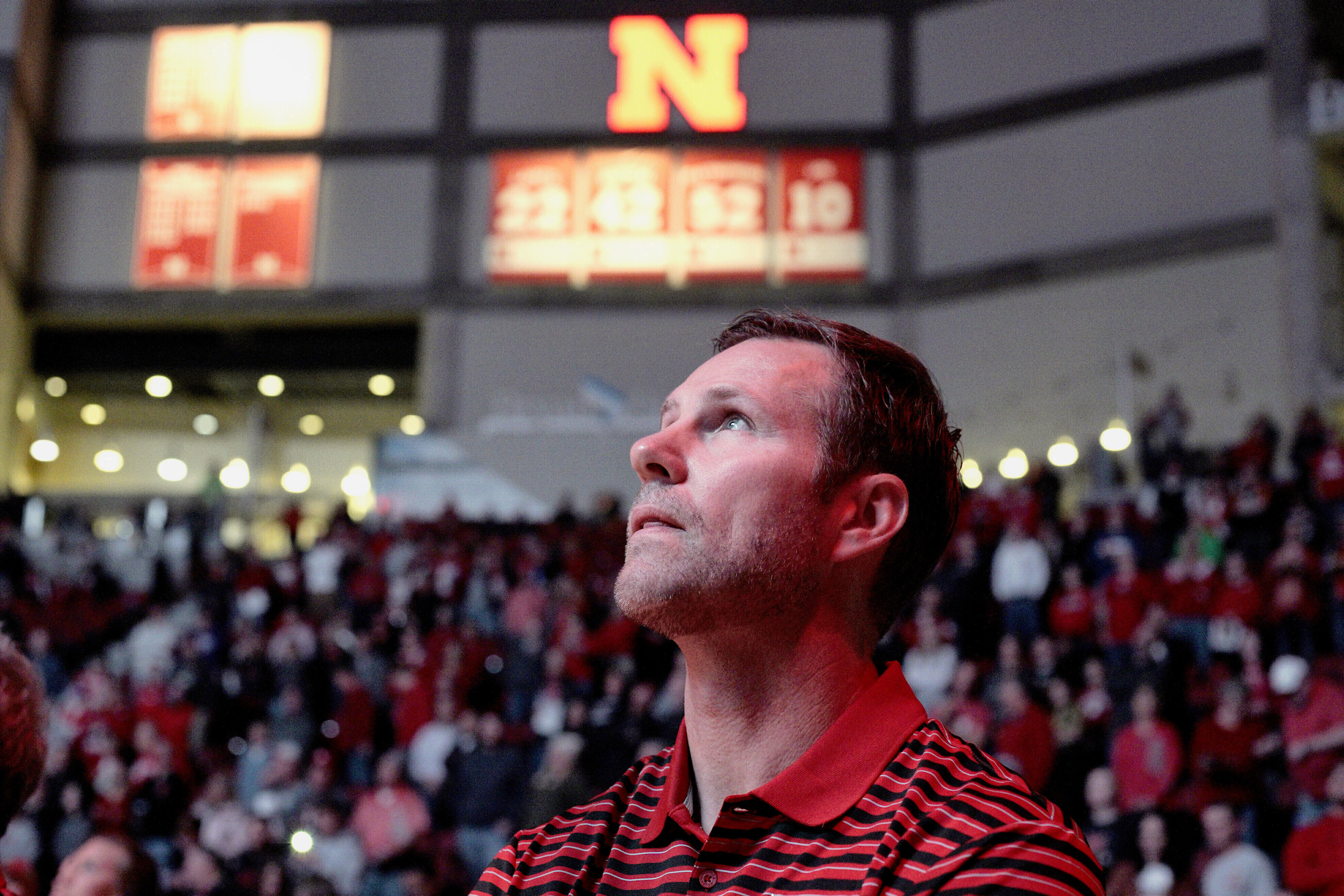 FILE - Nebraska coach Fred Hoiberg looks at the overhead screen during player introductions before an NCAA college basketball exhibition game against Doane University in Lincoln, Neb., Oct. 30, 2019.