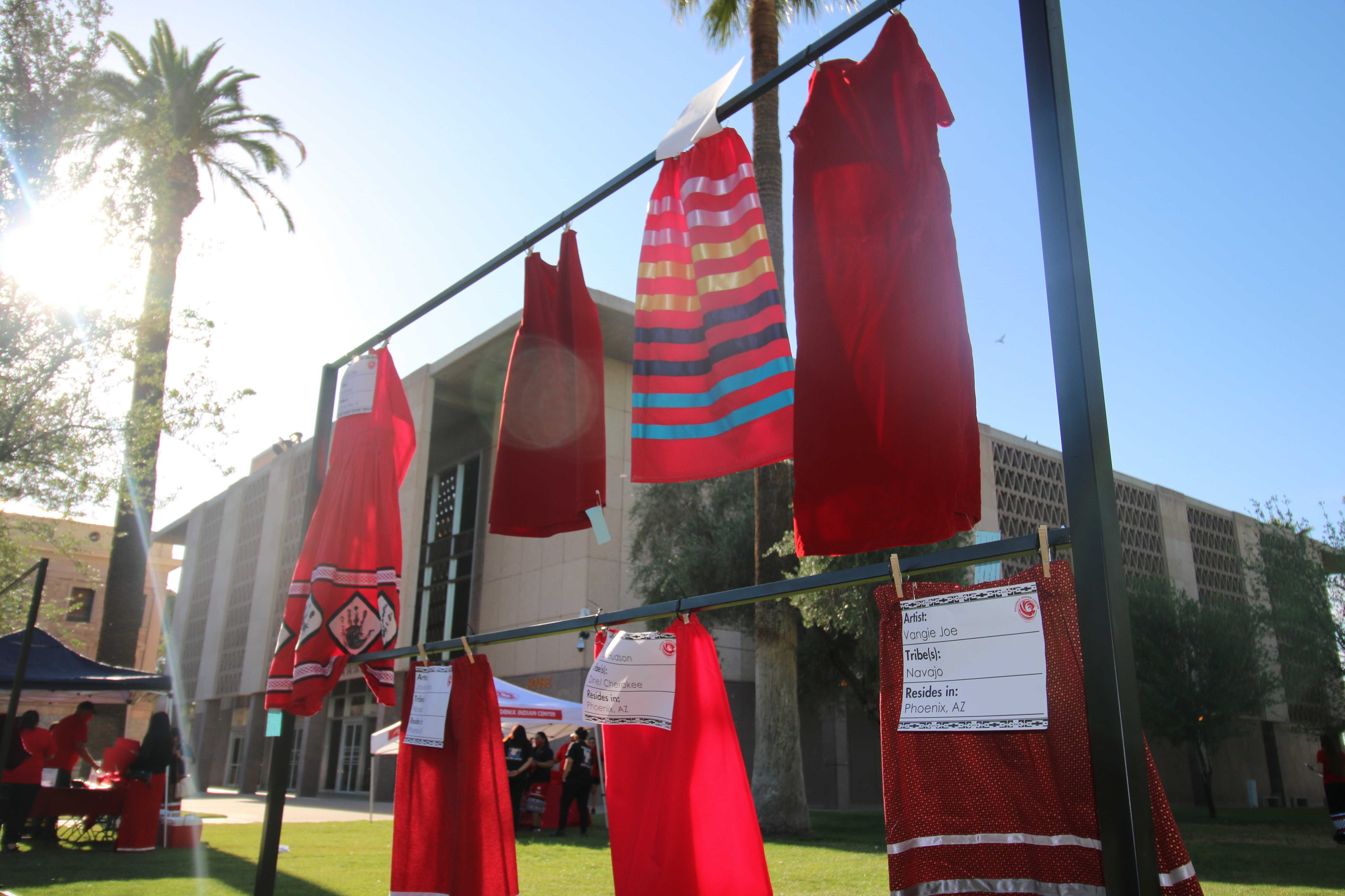 Red skirts are on display at the Arizona State Capitol in Phoenix, May 5, 2021, to raise awareness for missing and murdered Indigenous women and girls. A man was sentenced to life in prison Monday in the death of a Navajo woman.
