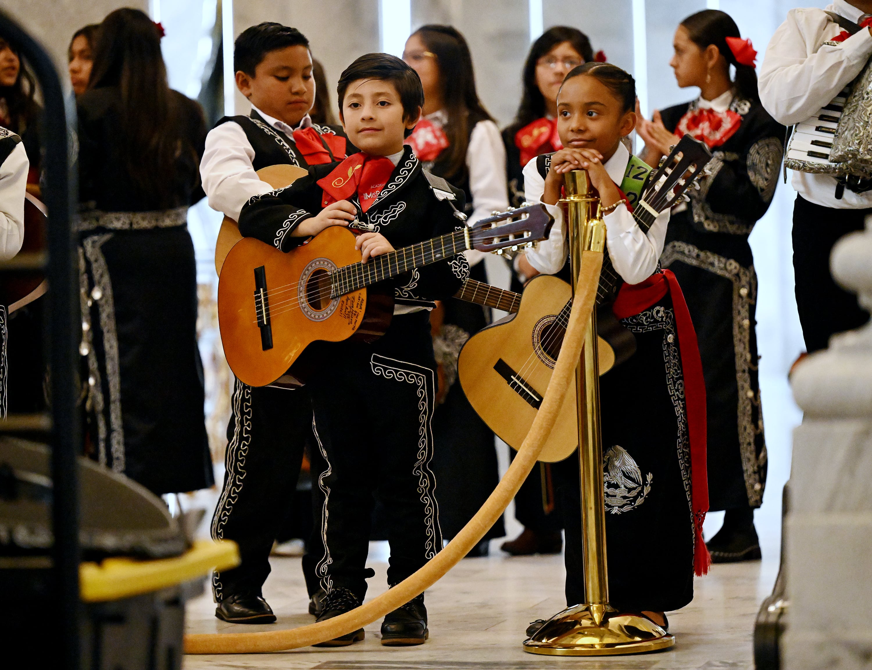 Young mariachi performers watch during Sones de Mariachi en Utah, a mariachi competition in connection with Hispanic Heritage Month 2023 at the Capitol in Salt Lake City on Aug. 30, 2023.