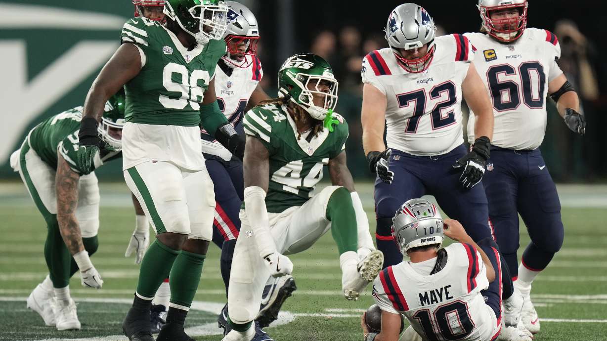 New York Jets linebacker Jamien Sherwood (44) reacts after sacking New England Patriots quarterback Drake Maye (10) during the fourth quarter of an NFL football game, Thursday, Sept. 19, 2024, in East Rutherford, N.J.