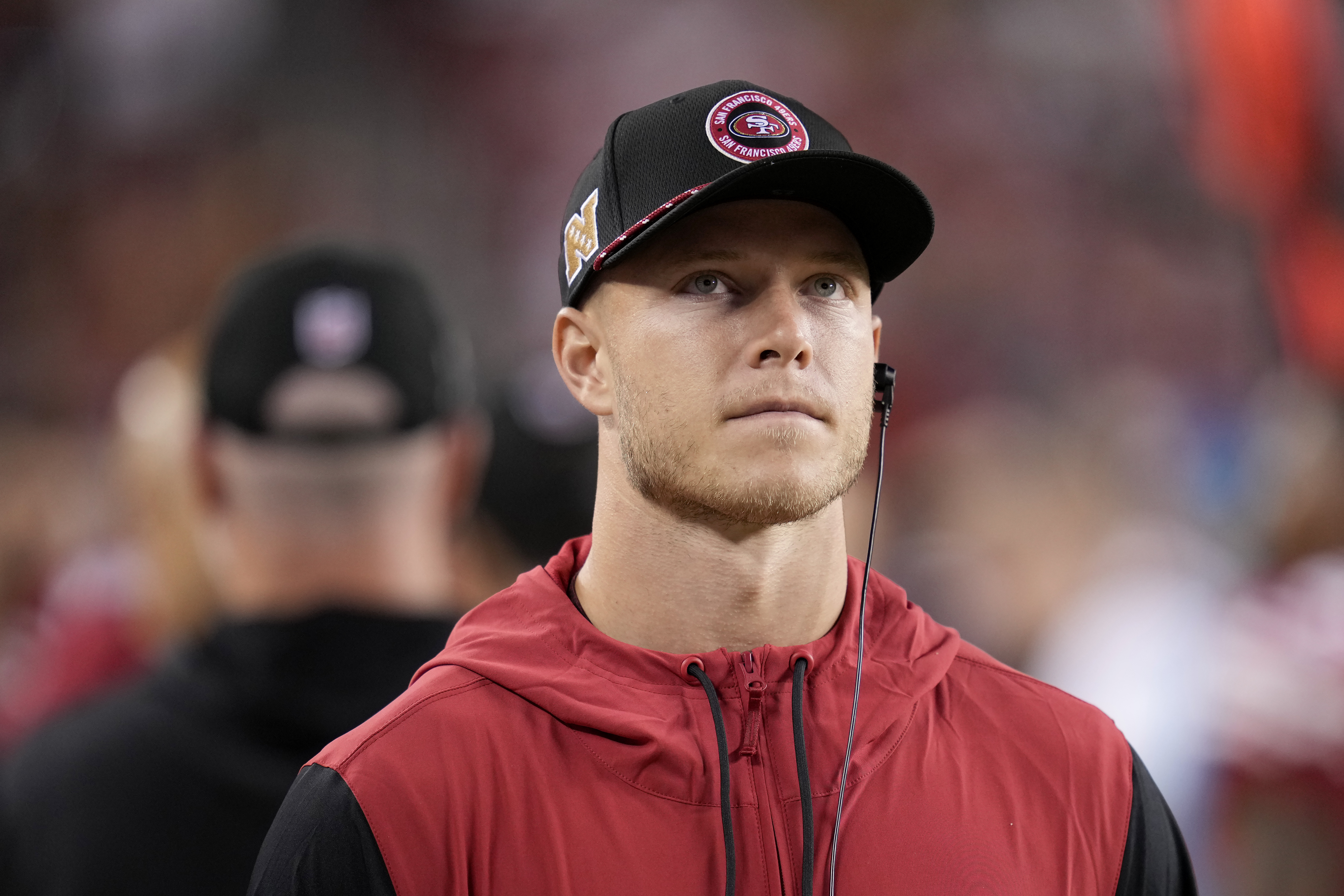 San Francisco 49ers running back Christian McCaffrey walks on the sideline during the second half of an NFL football game against the New York Jets in Santa Clara, Calif., Monday, Sept. 9, 2024. 