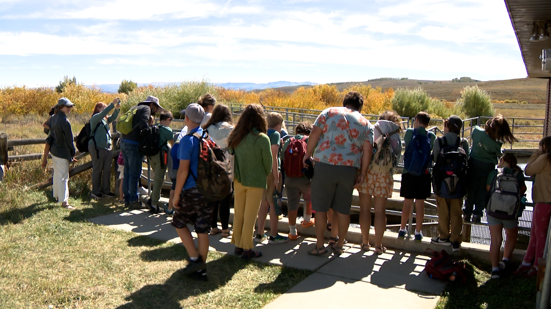 People flocked to Strawberry Reservoir on Monday to get a look at the bright-red kokanee salmon.