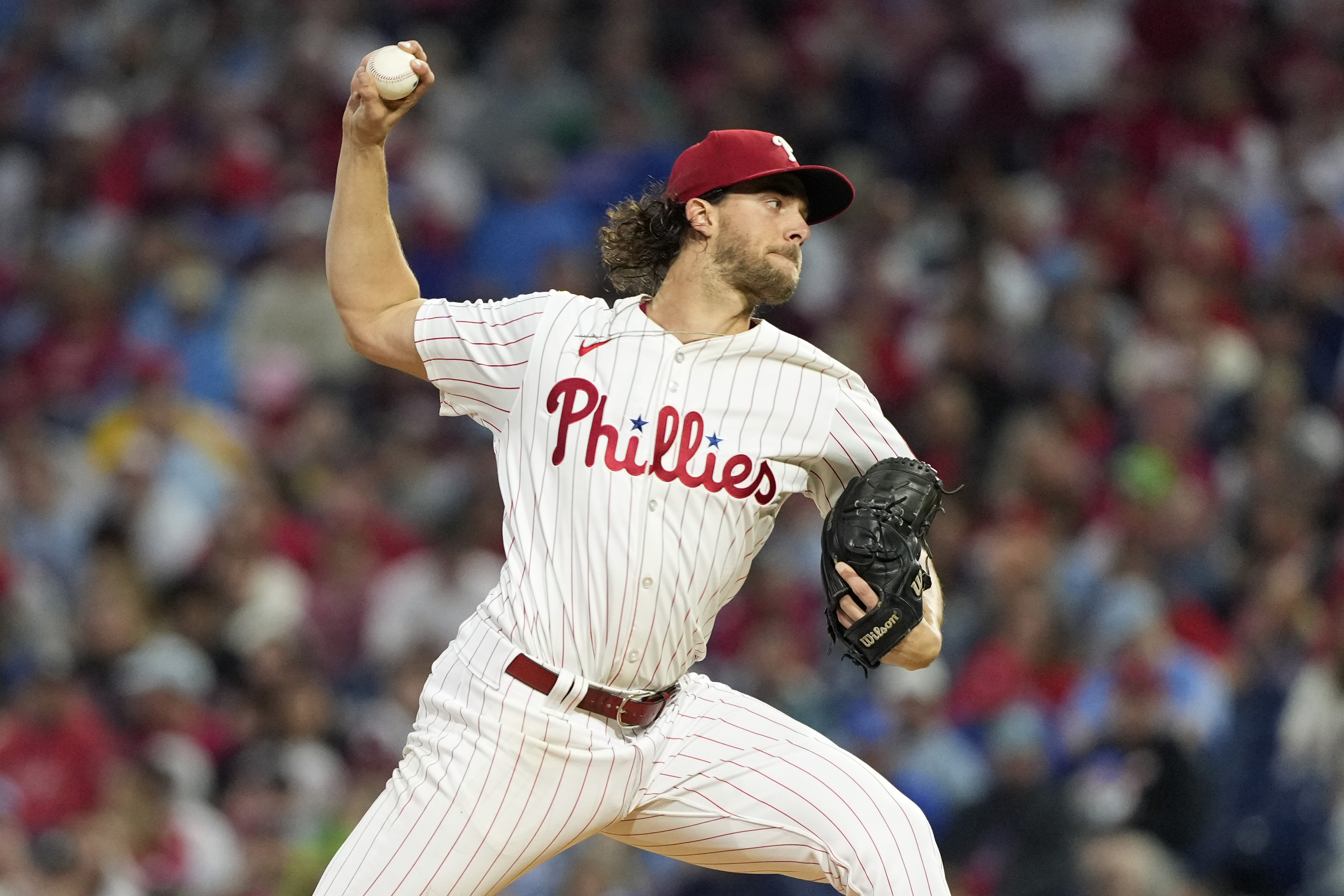 Schwarber and Realmuto homer as Phillies top Cubs 6-2 to clinch 1st NL East title since 2011