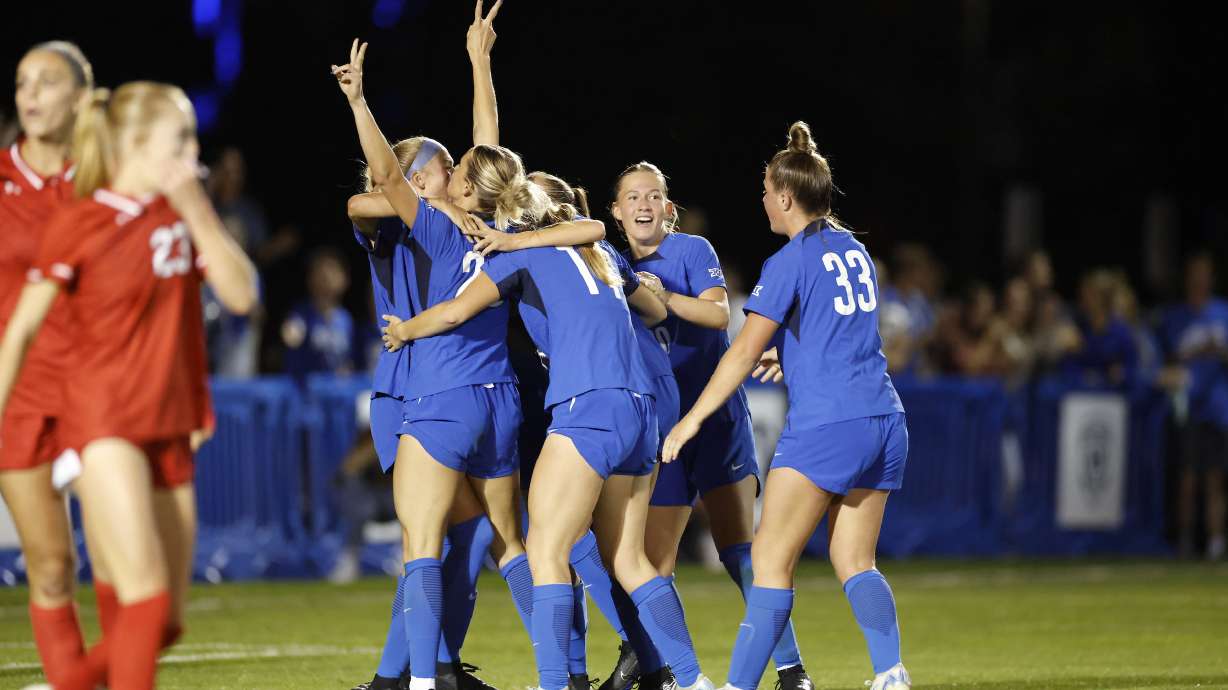 Allie Fryer celebrates a goal with her BYU teammates during a Big 12 women's soccer match against archrival Utah, Monday, Sept. 23, 2024 at South Field in Provo, Utah.